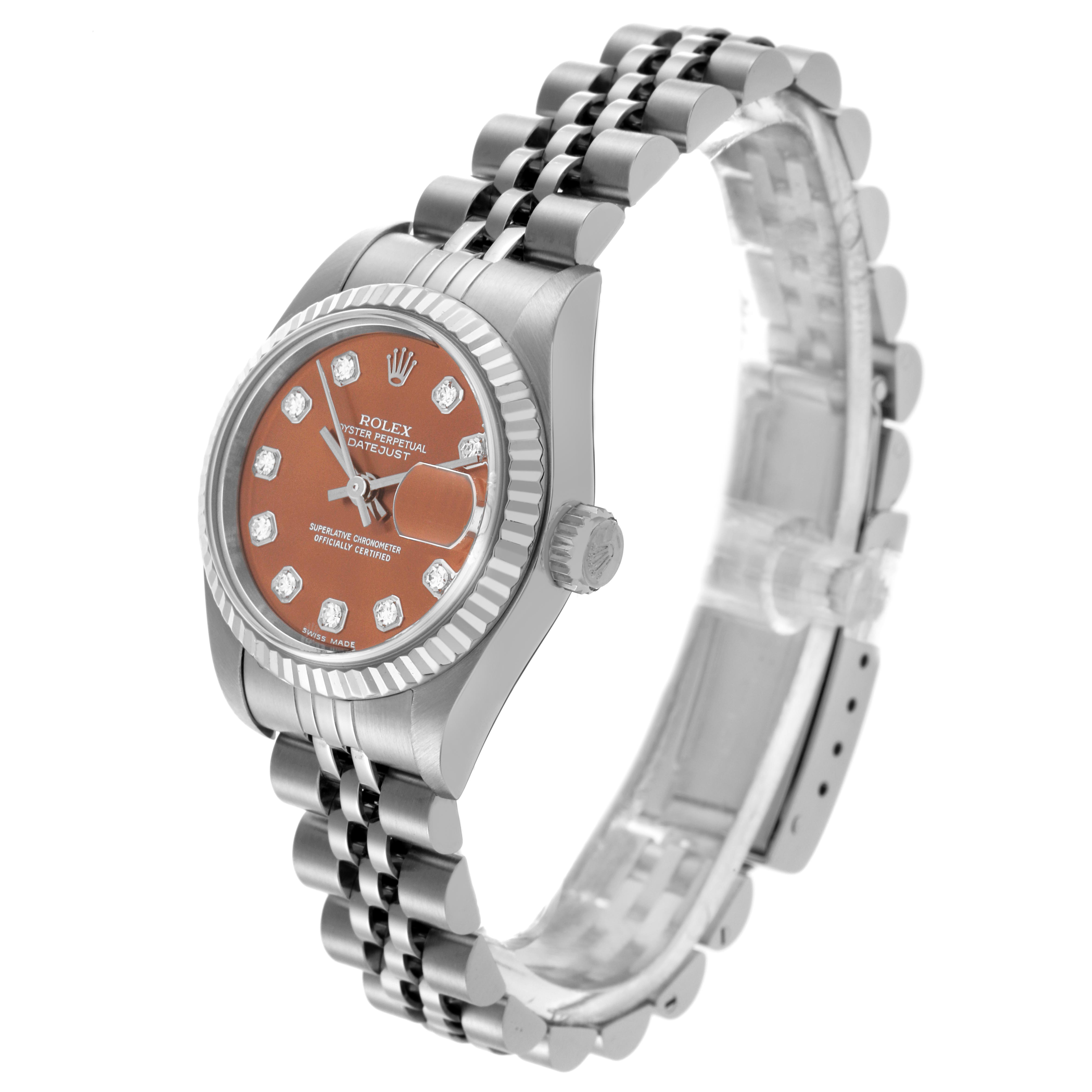 The Rolex Datejust 79174 Women's Stainless Steel Pink Dial 79174 Women's Stainless Steel Pink Dial watch is shown in a side angle, highlighting the dial, bezel, crown, and part of the jubilee bracelet.