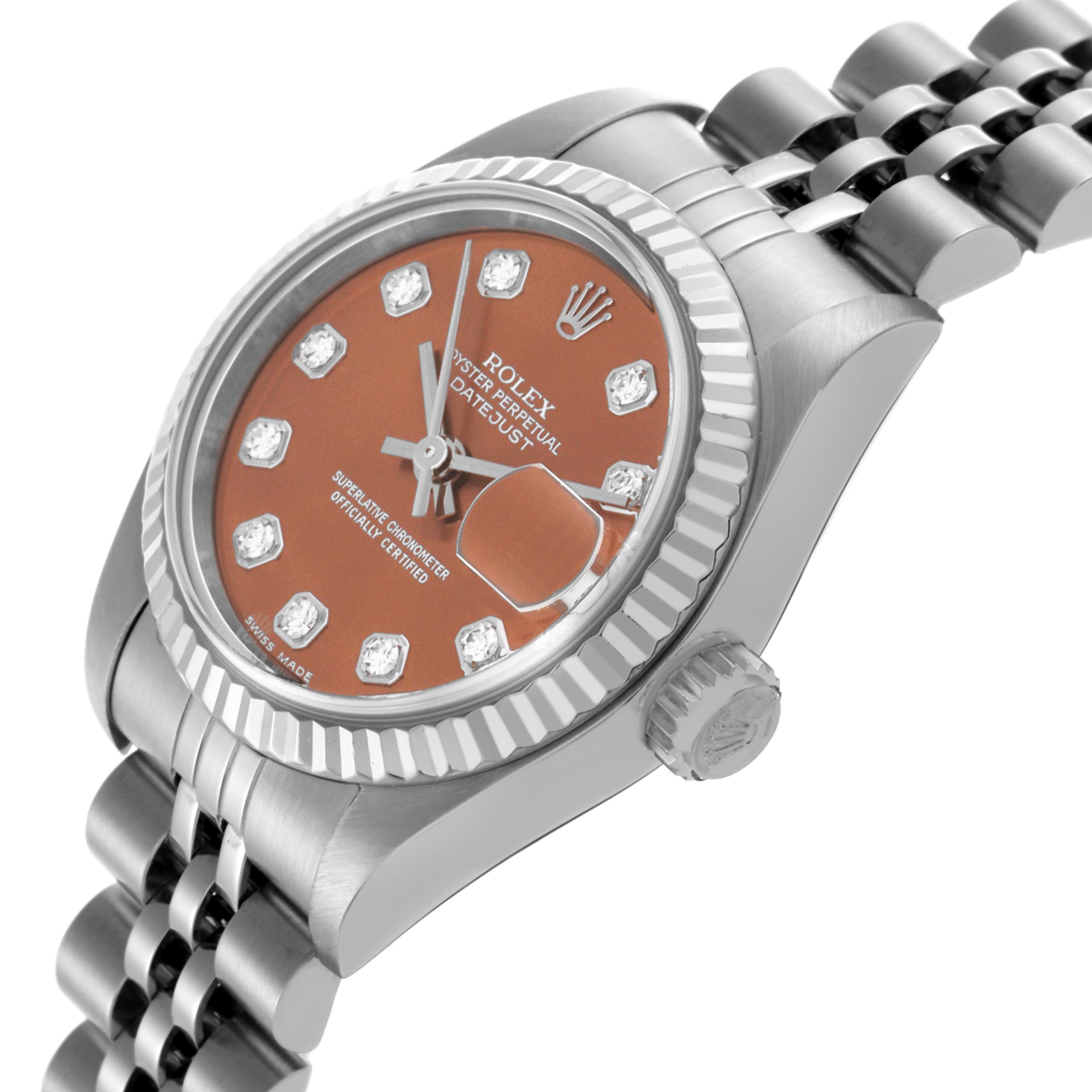 The Rolex Datejust 79174 Women's Stainless Steel Pink Dial 79174 Women's Stainless Steel Pink Dial watch is shown from a side angle displaying the case, crown, bezel, and bracelet with a clear view of the dial and markers.