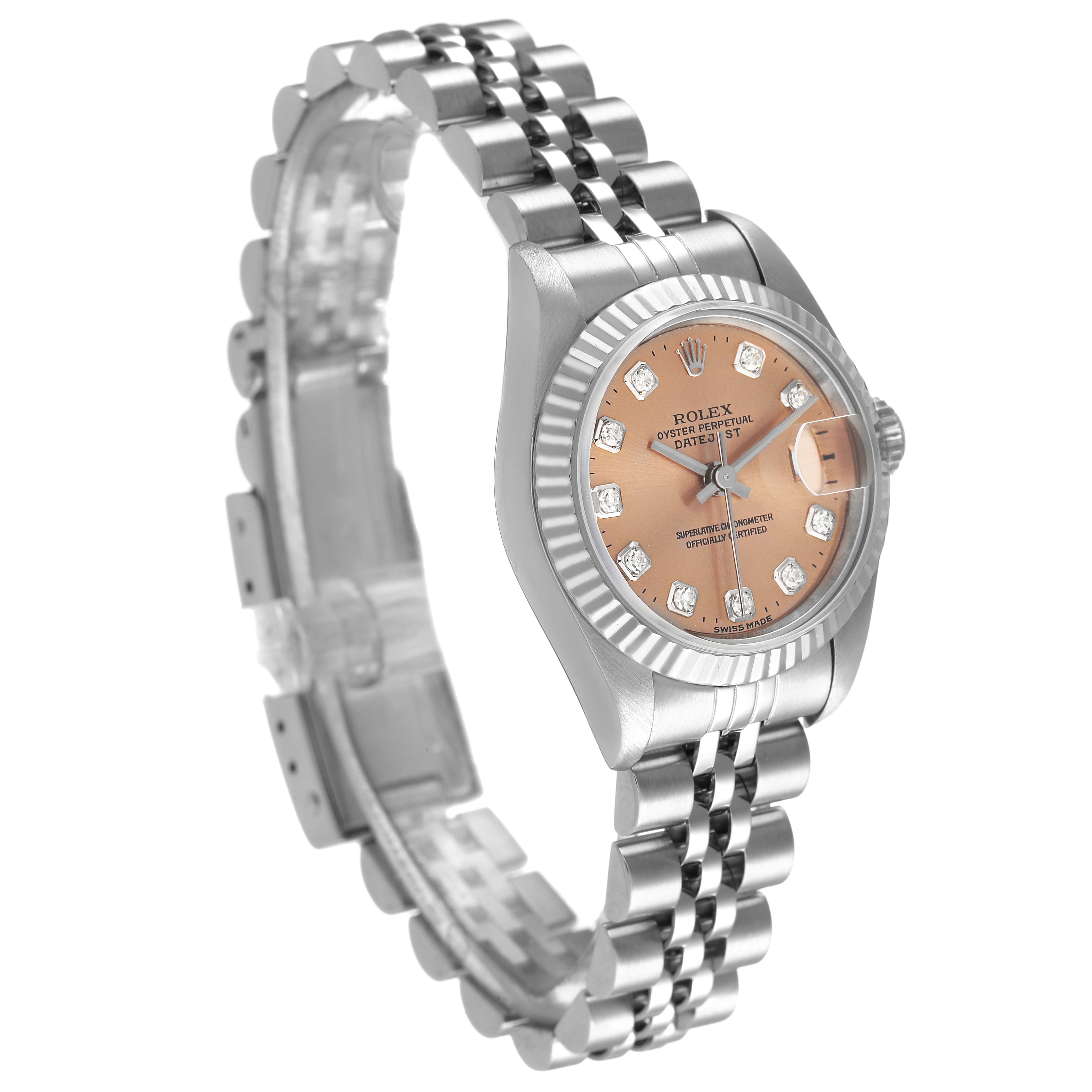 The Rolex Datejust 79174 Women's Stainless Steel Pink Dial watch is shown at an angled view highlighting the fluted bezel, jubilee bracelet, and diamond hour markers.