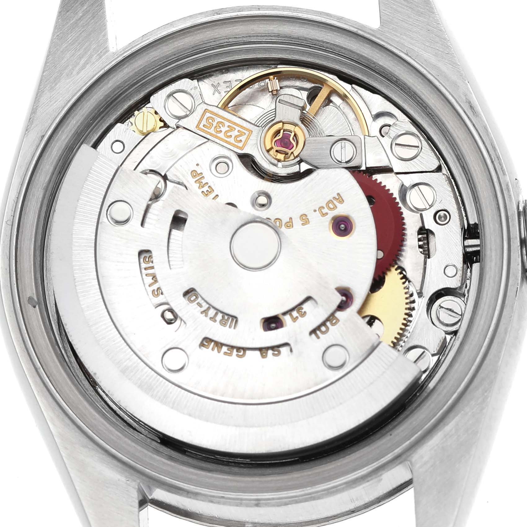 The image shows the movement and internal components of a Rolex Datejust 79174 Women's Stainless Steel Pink Dial watch from a back view angle.