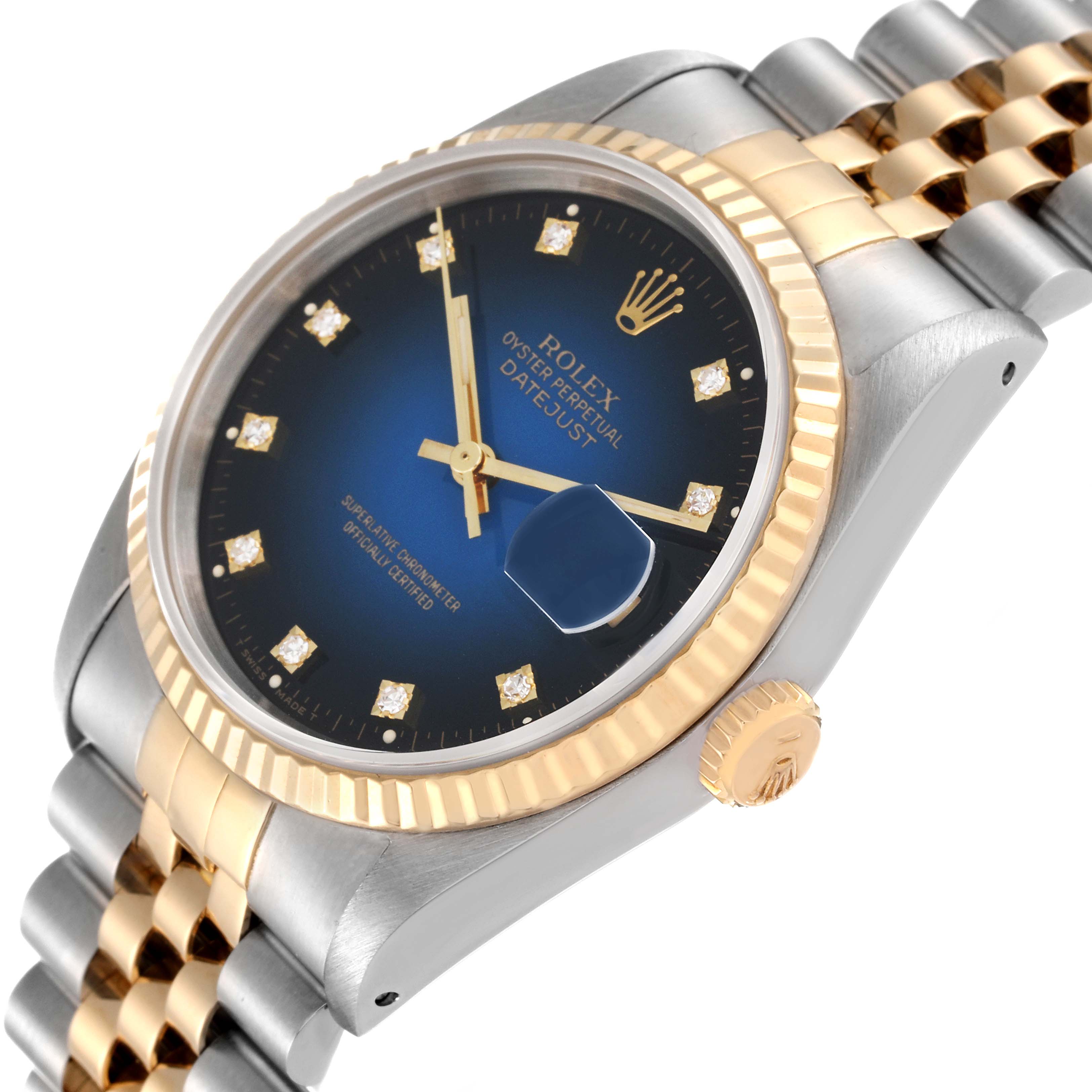 The image shows a close-up side angle of a Rolex Datejust 16233 Men's Steel and Gold (two tone) Blue Dial 16233 Men's Steel and Gold (two tone) Blue Dial watch, displaying the blue dial, crown, fluted bezel, and two-tone bracelet.