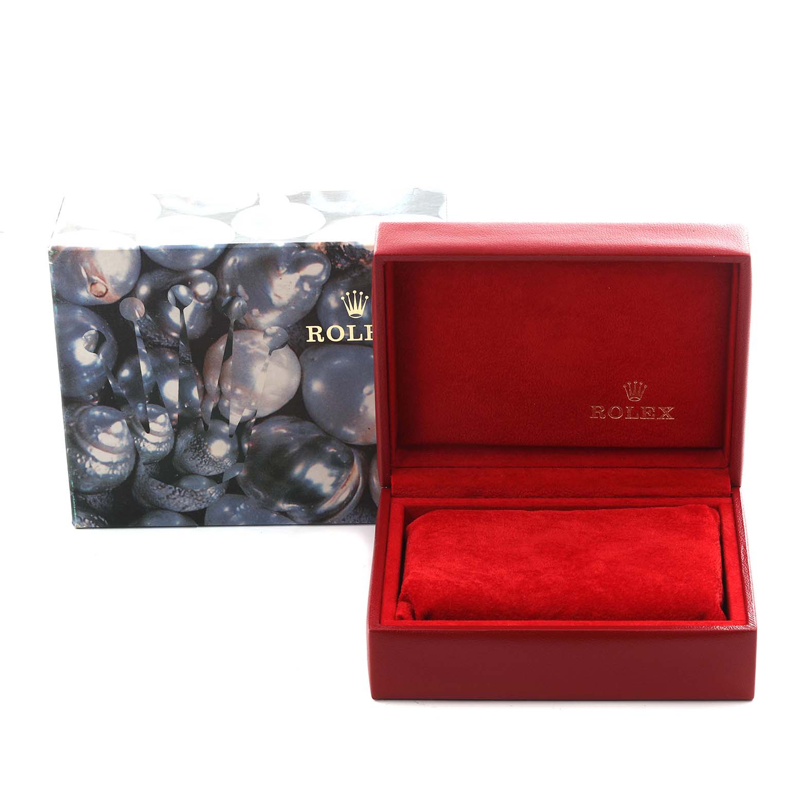 The image shows a Rolex Datejust 79173 Women's Steel and Gold (two tone) White Dial 79173 Women's Steel and Gold (two tone) White Dial box and pillow, viewed from the front, with decorative packaging.