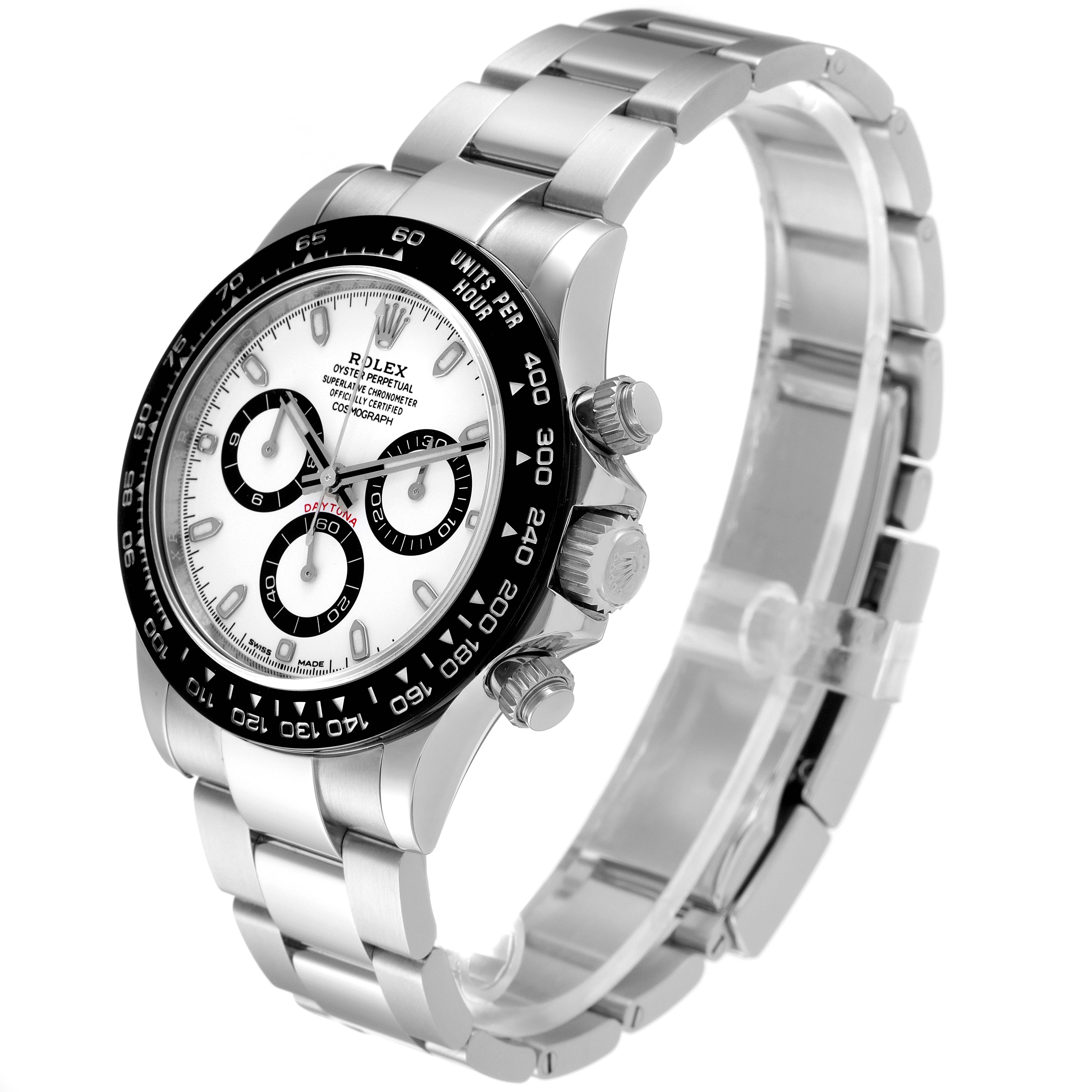 The image shows the Rolex Daytona 116500 Men's Stainless Steel White Dial 116500 Men's Stainless Steel White Dial watch from a side-angle, highlighting the bezel, dial, crown, and bracelet.