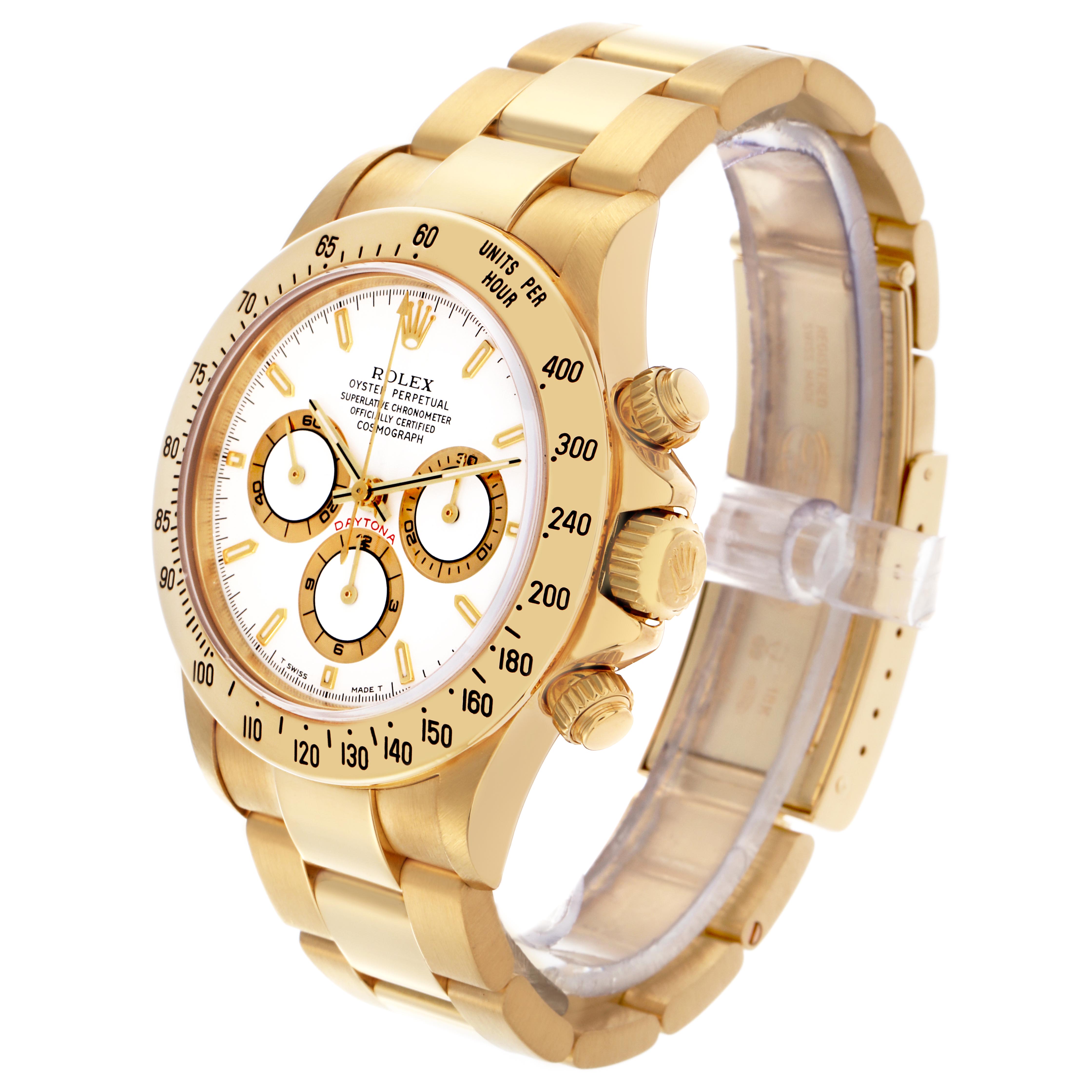 The Rolex Daytona 16528 Men's Yellow Gold White Dial 16528 Men's Yellow Gold White Dial watch is shown at a three-quarter angle, highlighting the dial, bezel, crown, and bracelet.