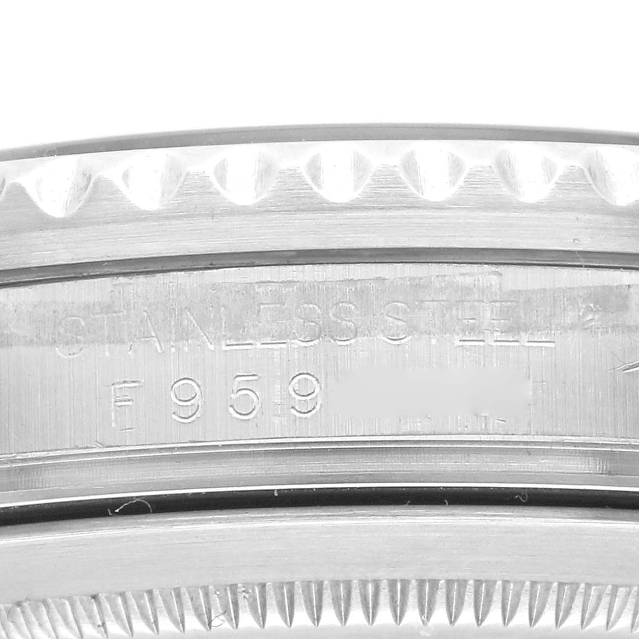 This close-up image shows the side view of the bezel and case back of a Rolex GMT-Master 16710 Men's Stainless Steel Black Dial 16710 Men's Stainless Steel Black Dial watch.