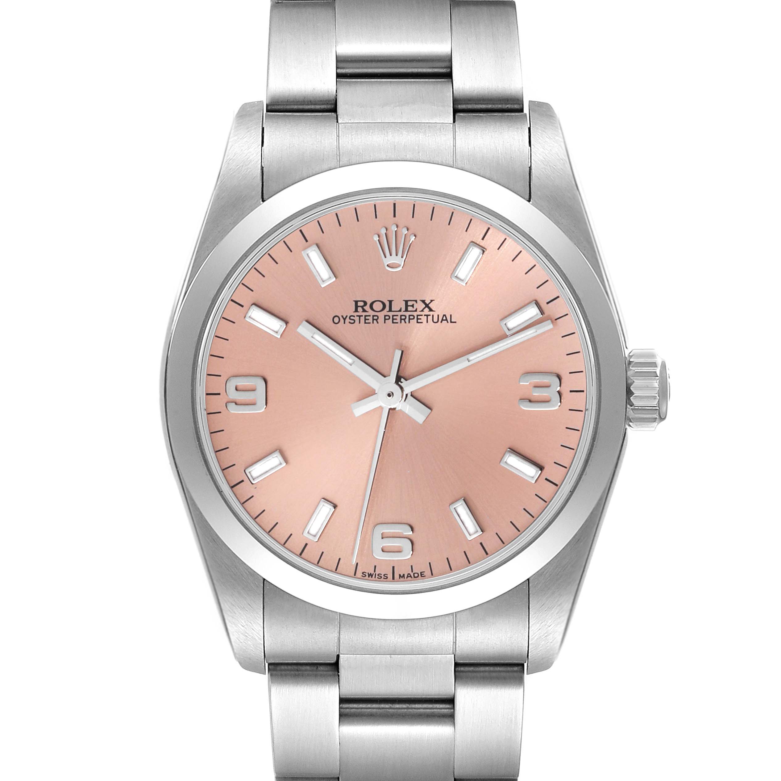 The Rolex Mid-Size 77080 Women
s Stainless Steel Pink Dial 77080 Women
s Stainless Steel Pink Dial Oyster Perpetual watch is shown from the front, displaying the dial, crown, and part of the bracelet.