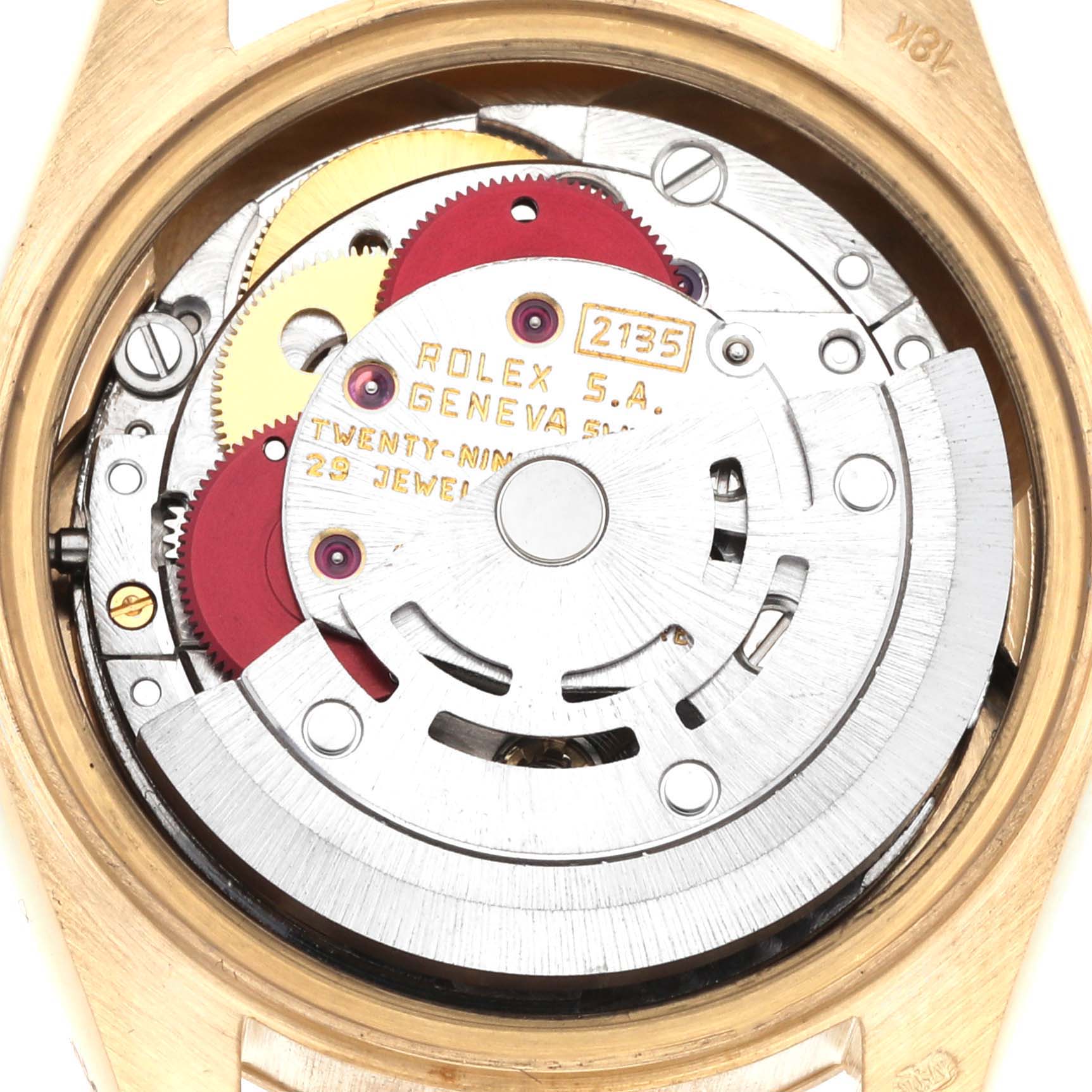 The image shows the intricate movement of a Rolex President 69178 Women
s Yellow Gold Champagne Dial 69178 Women
s Yellow Gold Champagne Dial watch, viewed from the back, highlighting gears and components.
