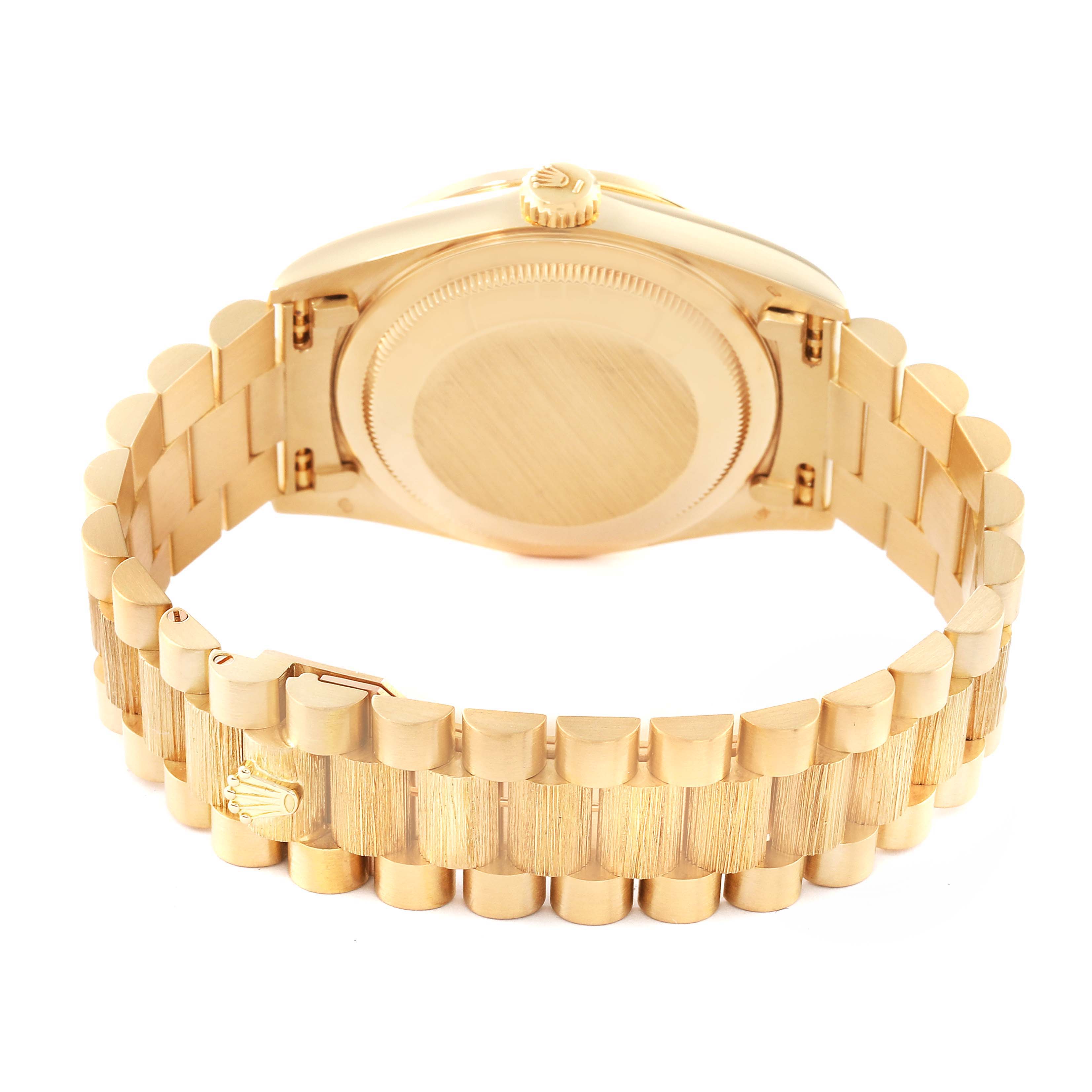 This image shows the back view of a Rolex President 18308 Men's Yellow Gold Black Dial 18308 Men's Yellow Gold Black Dial model watch, highlighting its gold case and bracelet.