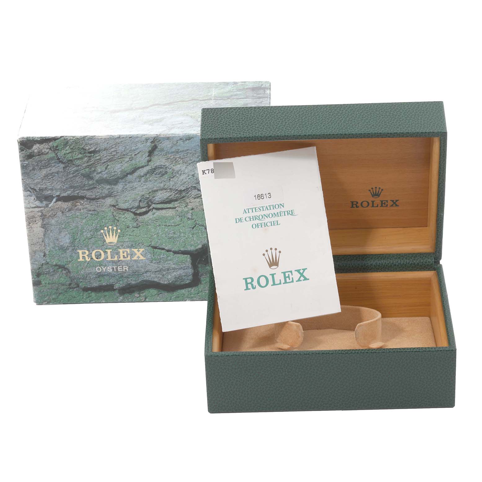 The image shows the empty packaging box and an official certification booklet for a Rolex Submariner 16613 Men's Steel and Gold (two tone) Blue Dial 16613 Men's Steel and Gold (two tone) Blue Dial watch.