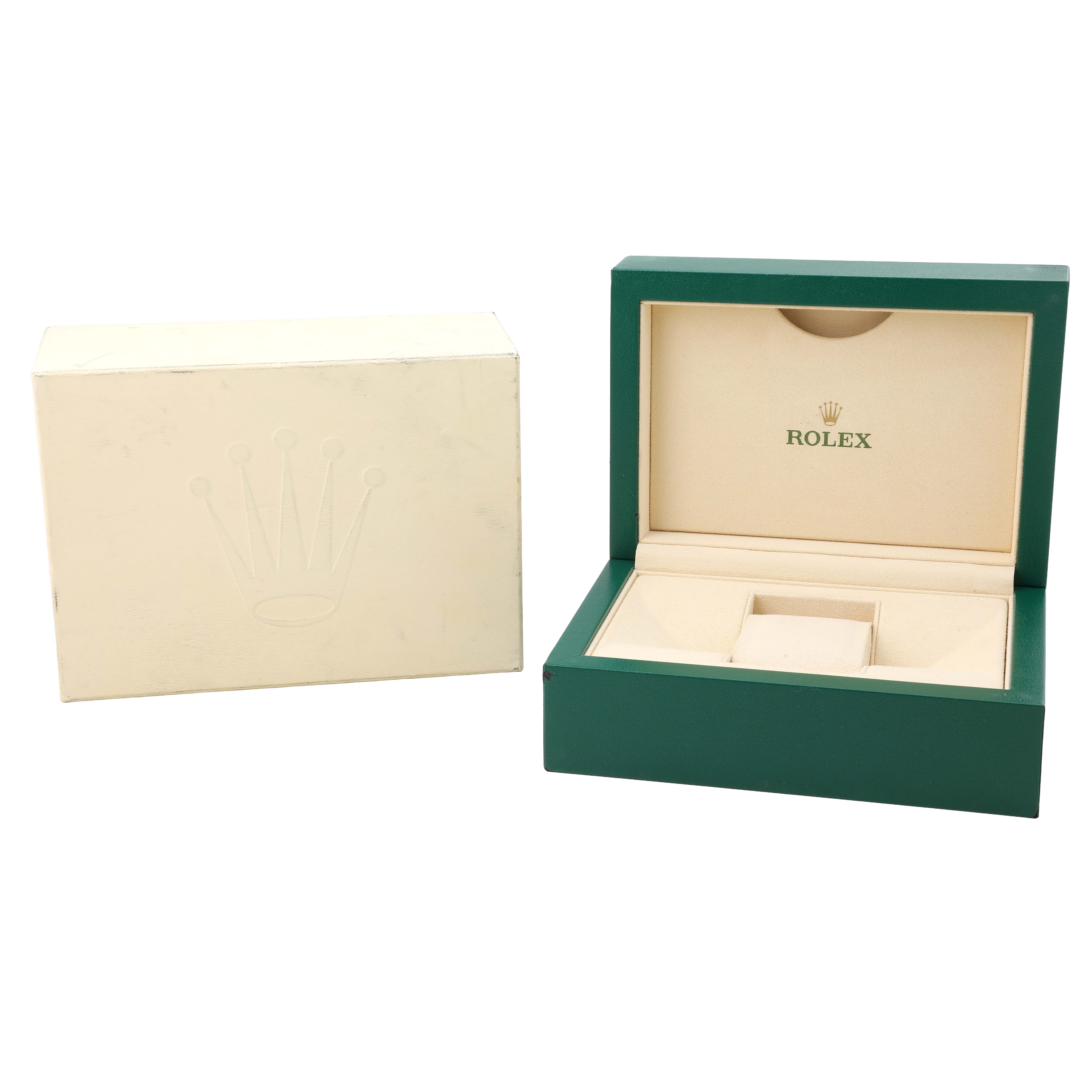 The image shows the packaging for a Rolex Submariner 124060 Men's Stainless Steel Black Dial: a green inner box and an outer box with the Rolex logo.