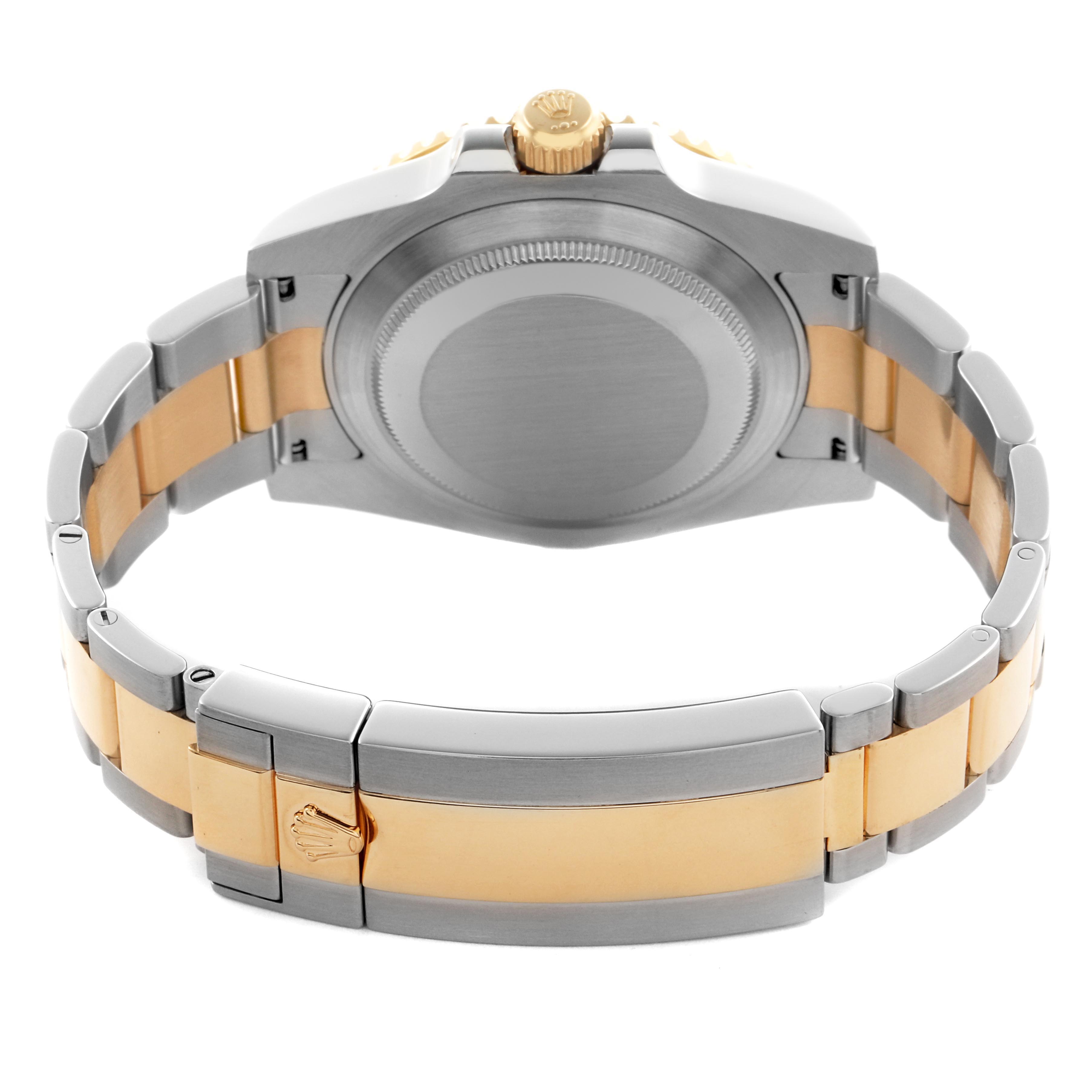 The image shows the back and bracelet of a Rolex Submariner 116613LB Men's Steel and Gold (two tone) Blue Dial 116613LB Men's Steel and Gold (two tone) Blue Dial, featuring two-tone metal links and the clasp with the Rolex logo.