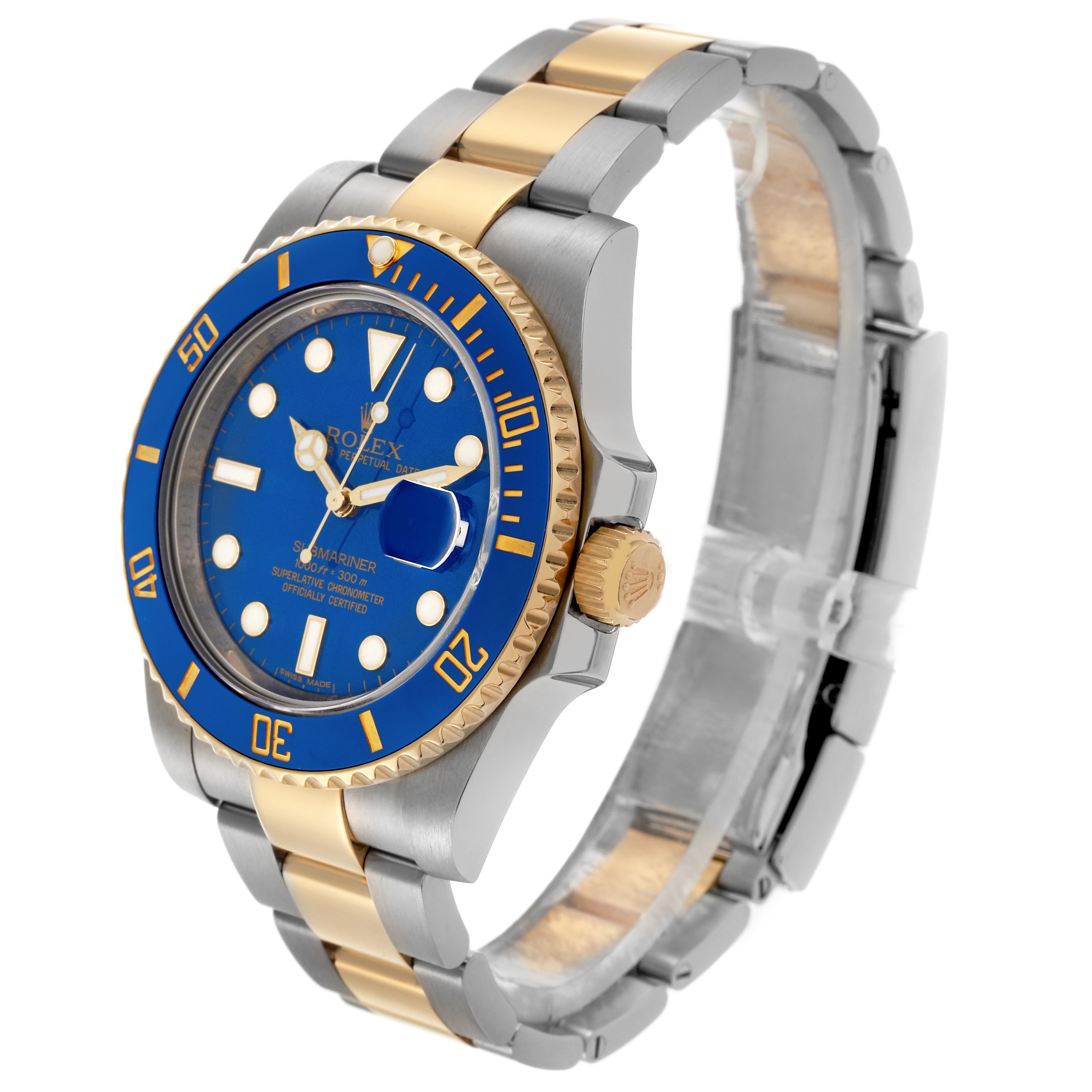 The Rolex Submariner 116613LB Men's Steel and Gold (two tone) Blue Dial 116613LB Men's Steel and Gold (two tone) Blue Dial watch is shown at a three-quarter angle, highlighting its blue dial, bezel, and two-tone bracelet.