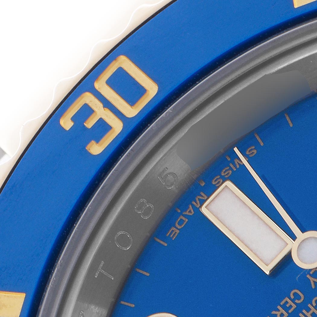 The image shows a close-up of the blue bezel and dial of a Rolex Submariner 116613LB Men's Steel and Gold (two tone) Blue Dial 116613LB Men's Steel and Gold (two tone) Blue Dial watch, highlighting the "30" marker.