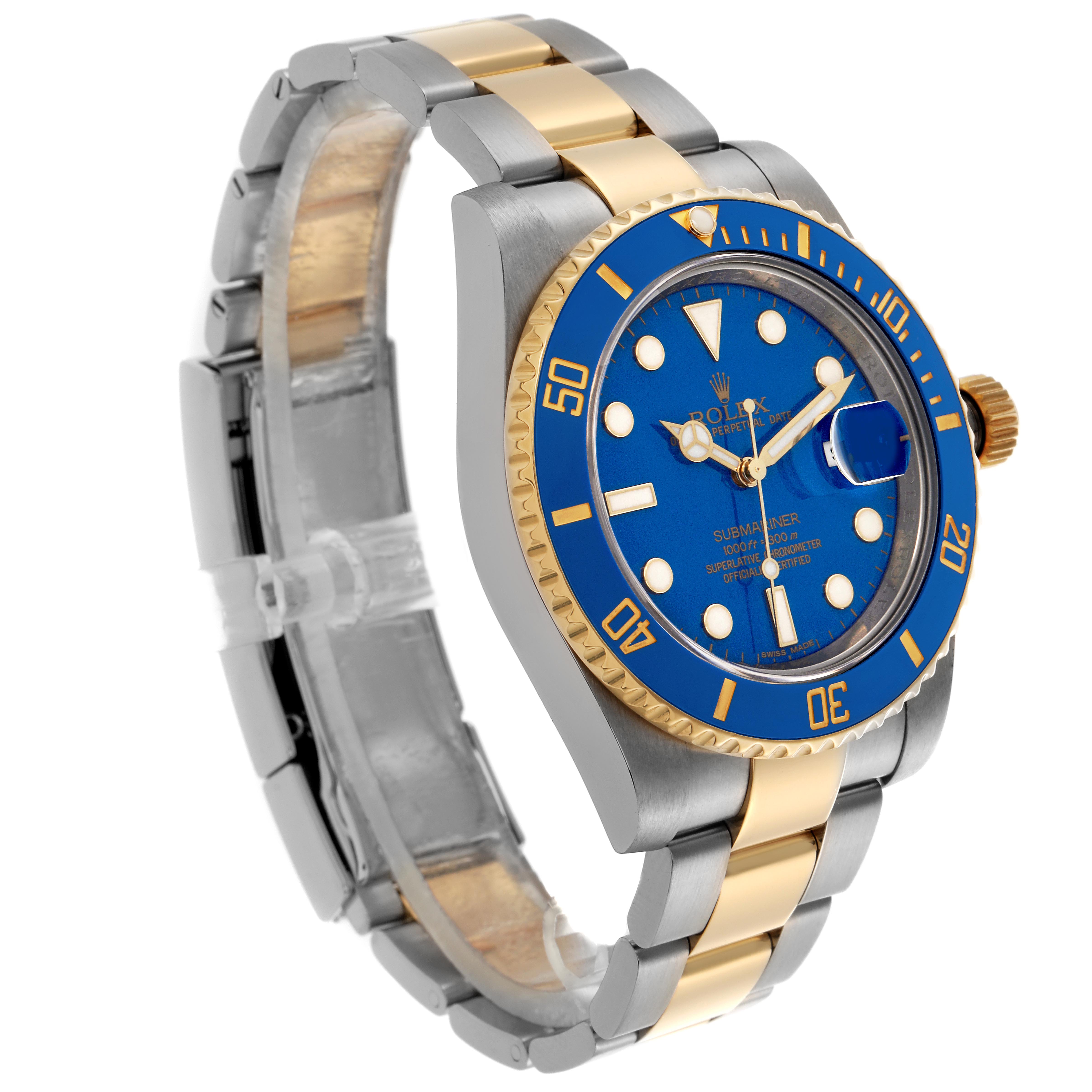 The Rolex Submariner 116613LB Men's Steel and Gold (two tone) Blue Dial 116613LB Men's Steel and Gold (two tone) Blue Dial is shown at an angle displaying its gold and silver bracelet, blue dial, and bezel.