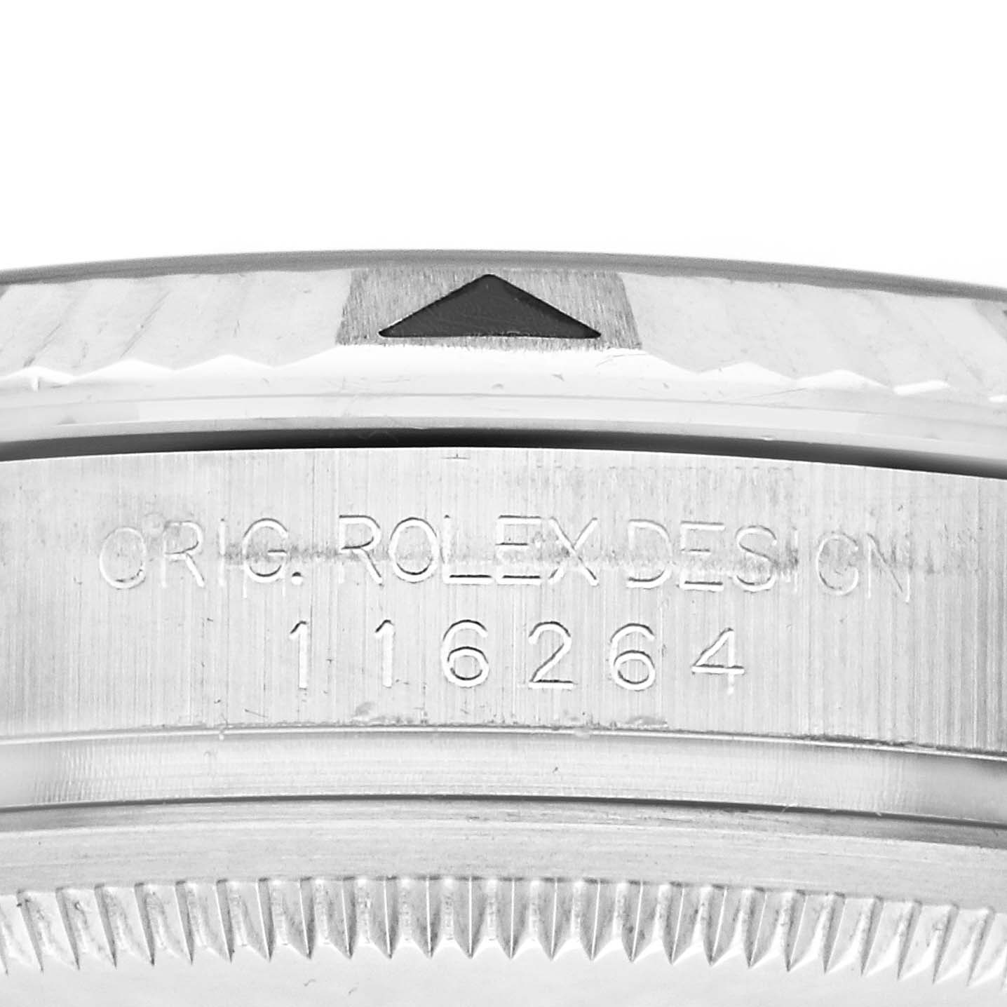 The image shows a close-up of the bezel's edge and engravings on the case of a Rolex Turn-o-Graph 116264 Men's Stainless Steel White Dial 116264 Men's Stainless Steel White Dial watch.