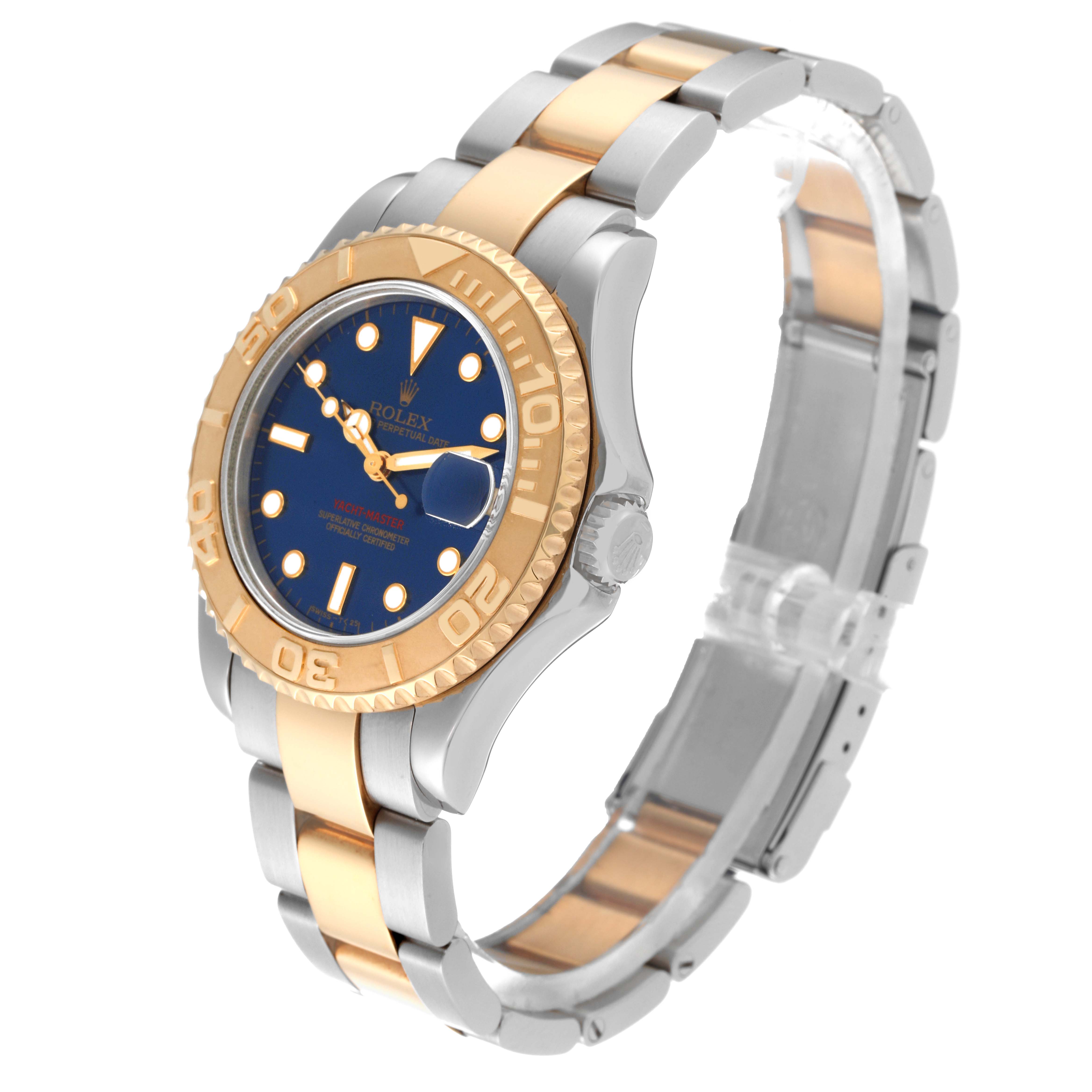 This Rolex Yacht-Master 68623 Men's Steel and Gold (two tone) Blue Dial 68623 Men's Steel and Gold (two tone) Blue Dial watch is shown at an angled side view, displaying the face, bezel, crown, and part of the bracelet.