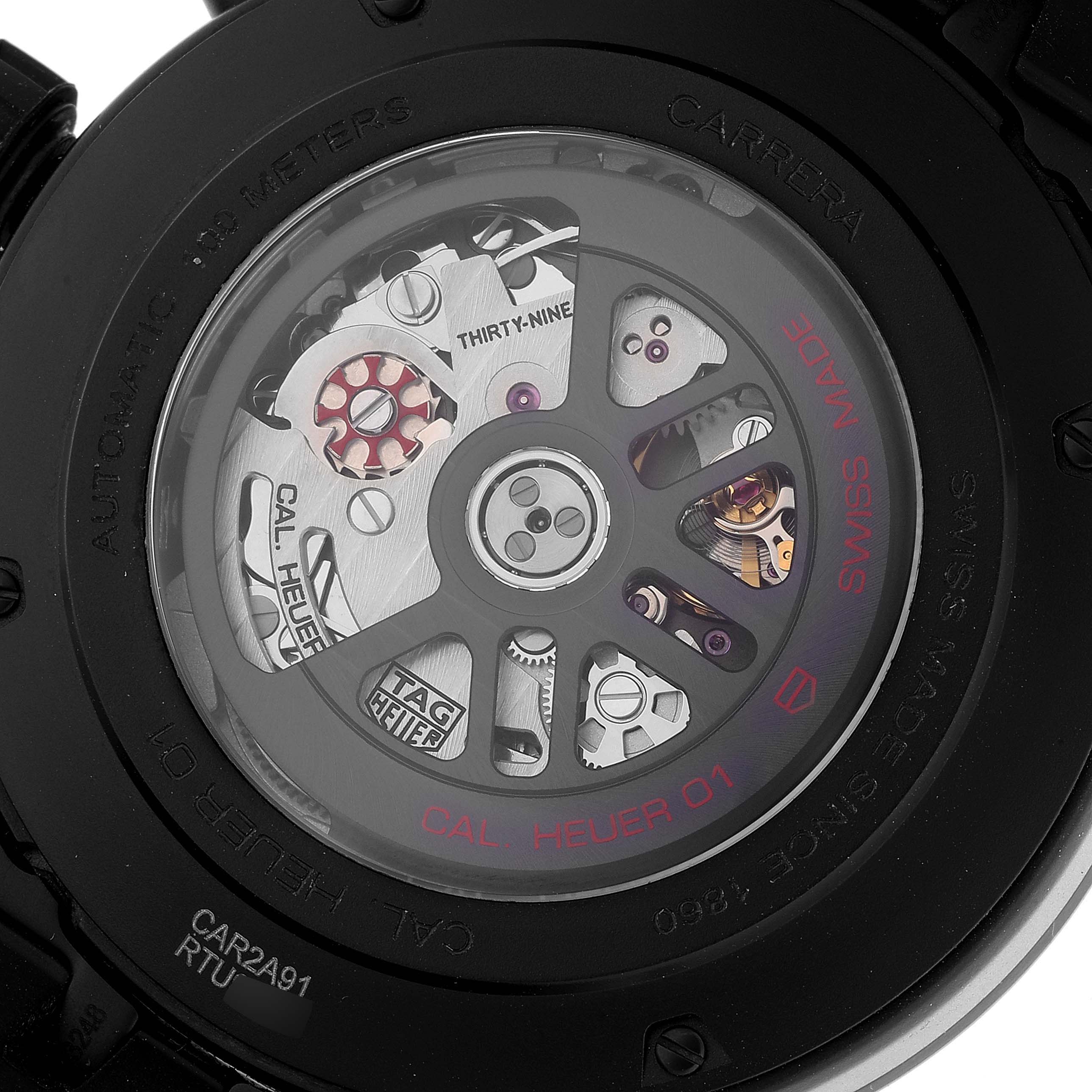 The image shows the back view of a Tag Heuer Carrera CAR2A91 Men's Ceramic Black Dial CAR2A91 Men's Ceramic Black Dial watch, focusing on its exposed automatic movement.