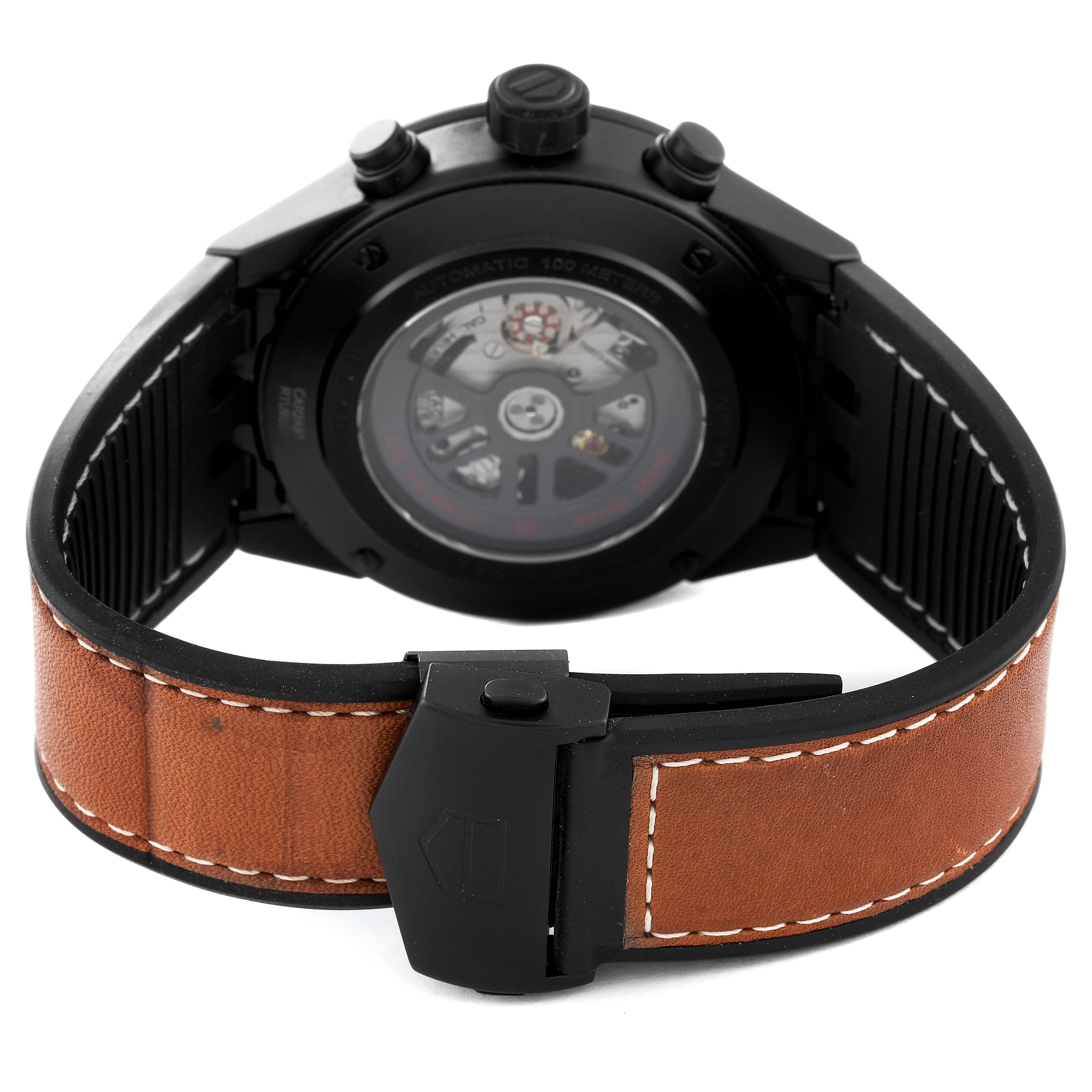 The image shows the back view of a Tag Heuer Carrera CAR2A91 Men's Ceramic Black Dial CAR2A91 Men's Ceramic Black Dial model watch, featuring its leather strap and exposed automatic movement.
