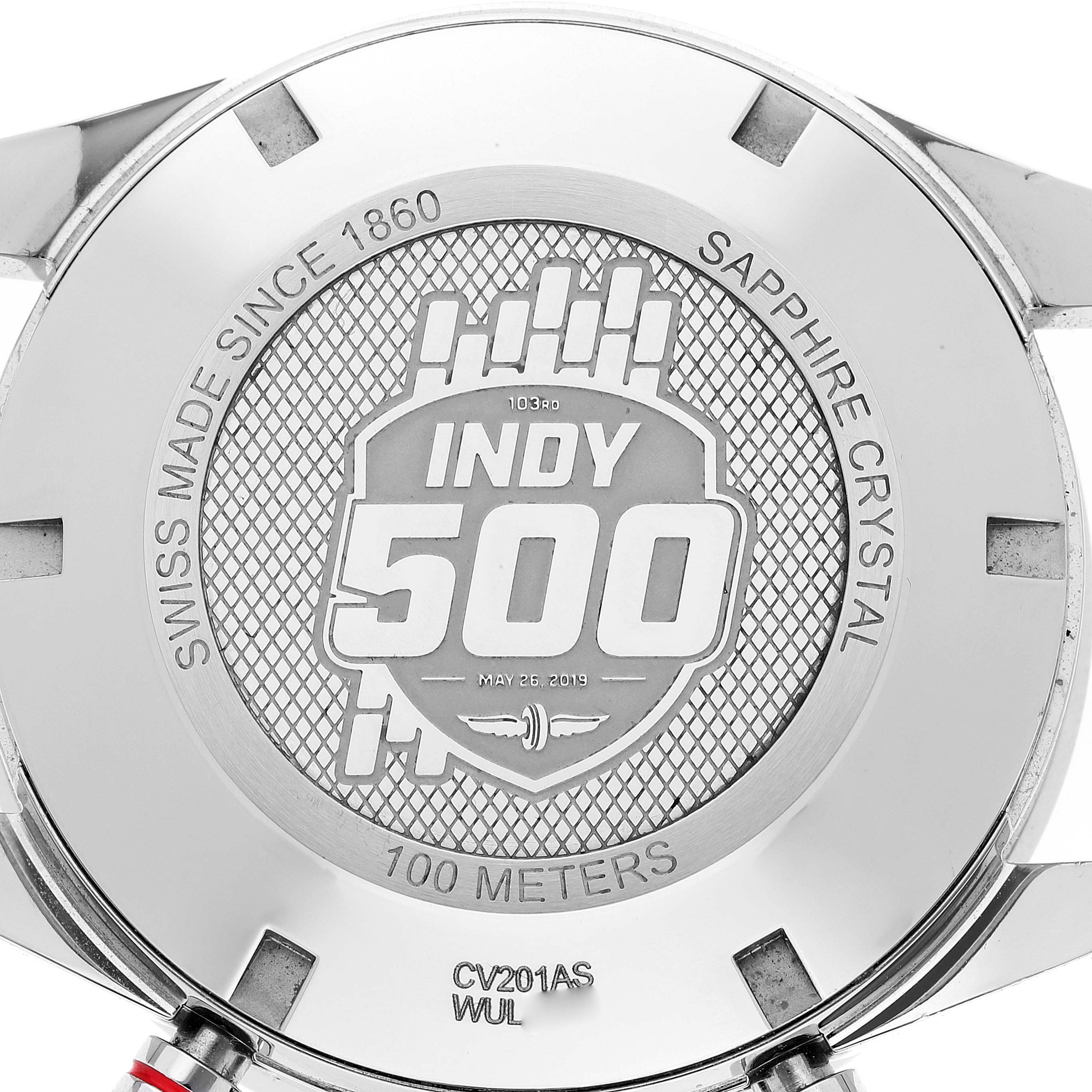 The image shows the back case of the Tag Heuer Carrera CV201AS.FC6429 Men's Stainless Steel Black Dial CV201AS.FC6429 Men's Stainless Steel Black Dial Indy 500 model watch, highlighting its engravings and specifications.