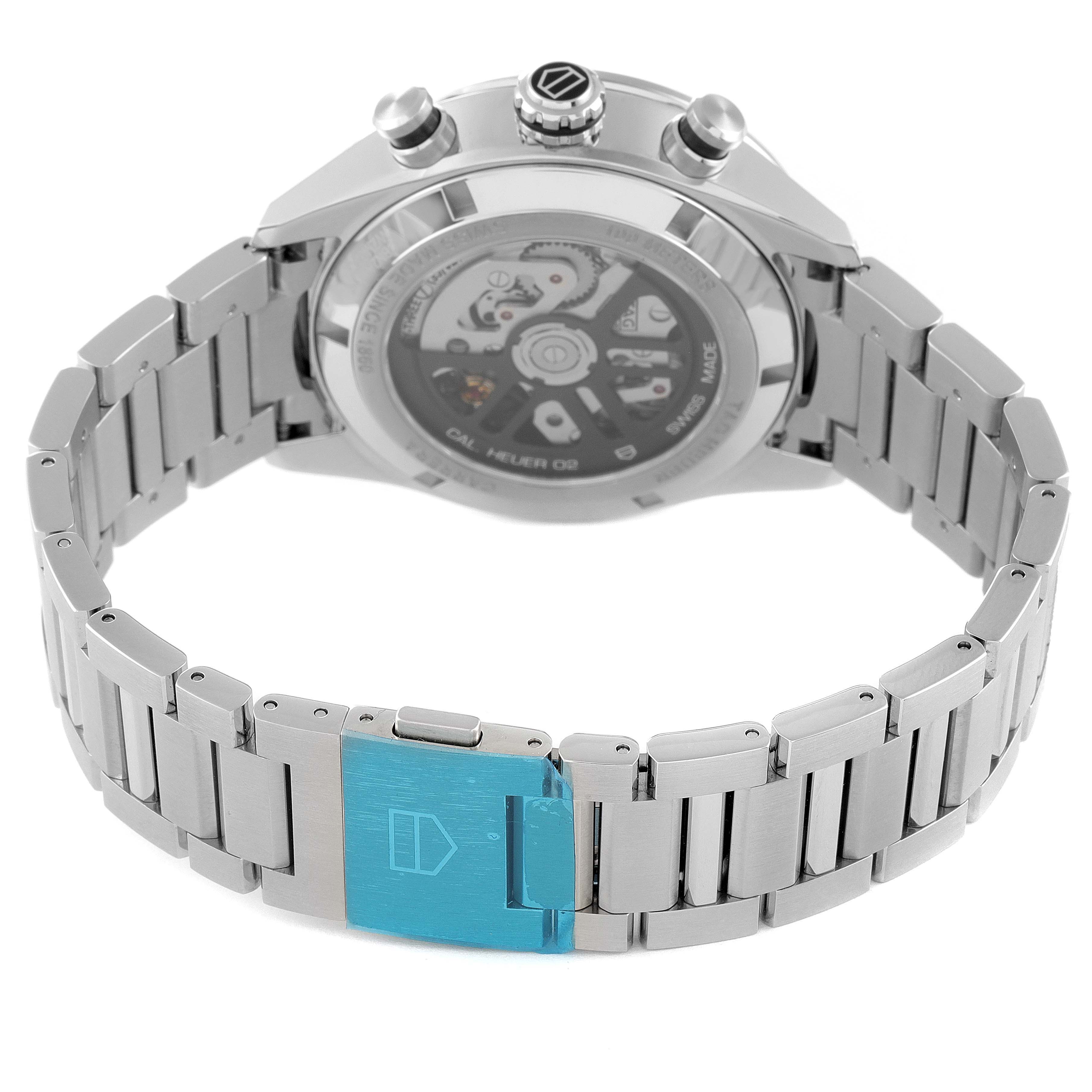 The image shows the back and stainless steel bracelet of the Tag Heuer Carrera CBN2A10.BA0643 Men's Stainless Steel Green Dial CBN2A10.BA0643 Men's Stainless Steel Green Dial watch, highlighting the movement and clasp.