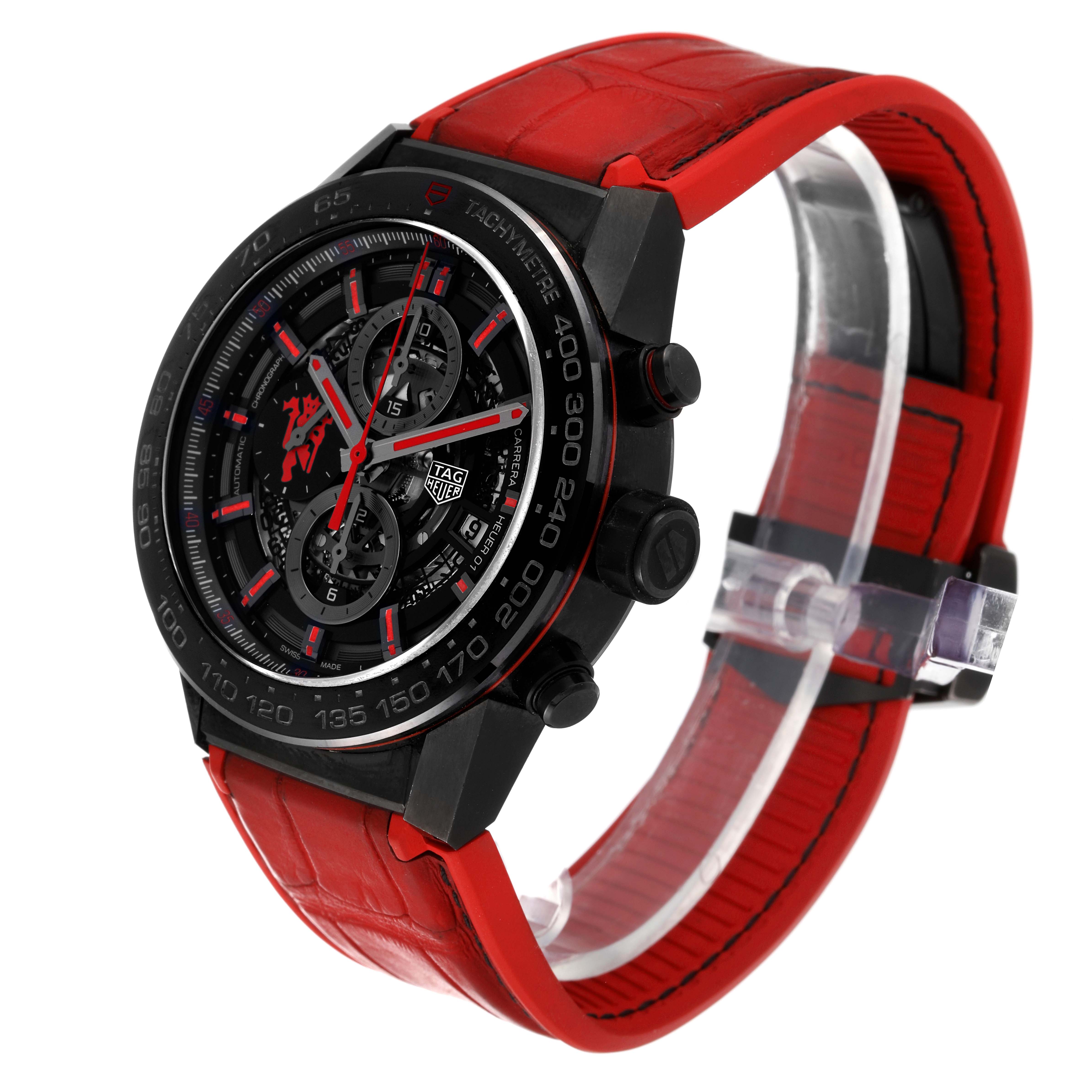 The image shows a side angle view of the Tag Heuer Limited Edition CAR2A1J.FC6400 Men
s Stainless Steel Transparent Dial CAR2A1J.FC6400 Men
s Stainless Steel Transparent Dial watch, highlighting its red strap, black case, and chronograph dial.