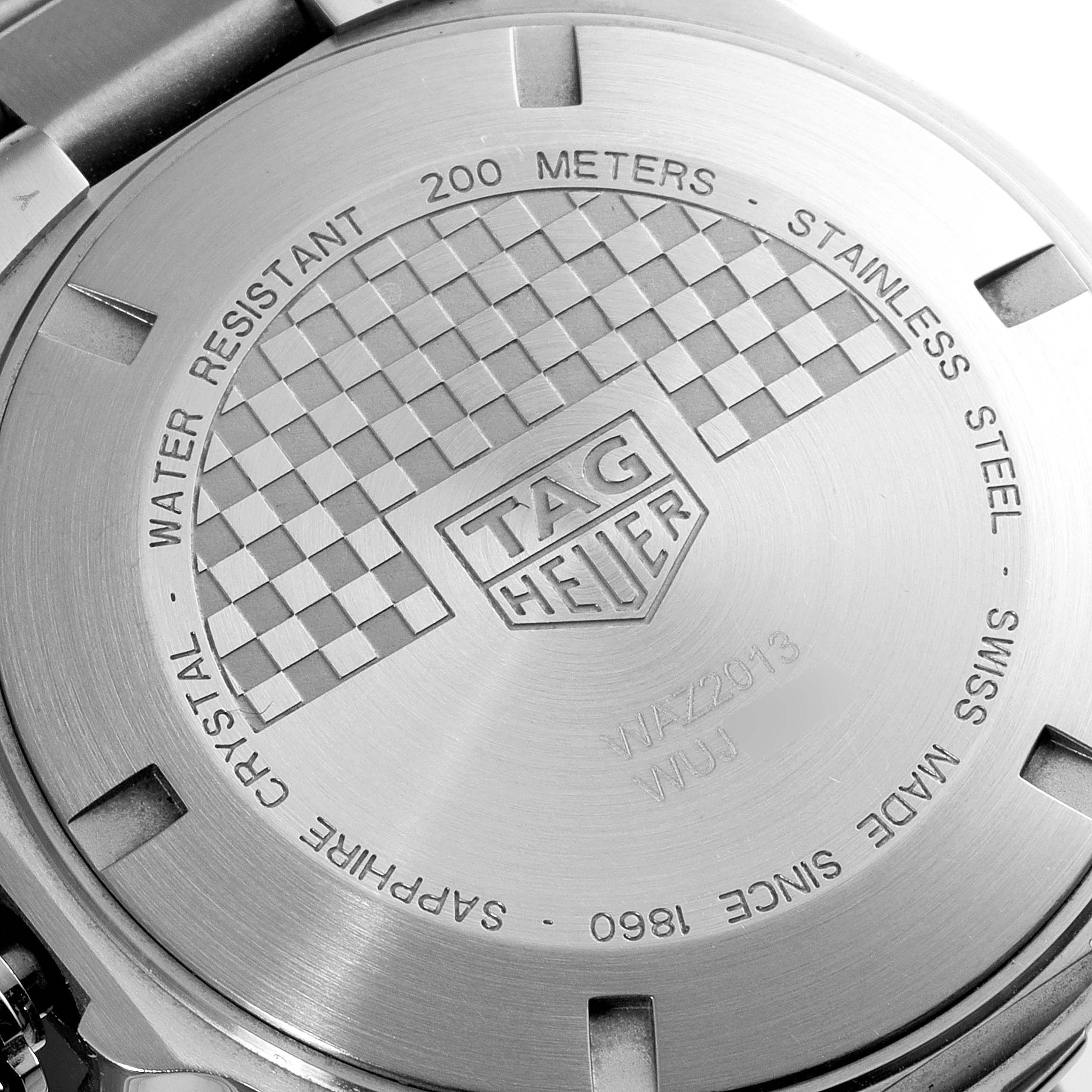 The image shows the back case of the Tag Heuer Formula 1 WAZ2013.BA0842 Men's Stainless Steel White Dial WAZ2013.BA0842 Men's Stainless Steel White Dial watch, highlighting its stainless steel construction and branding.