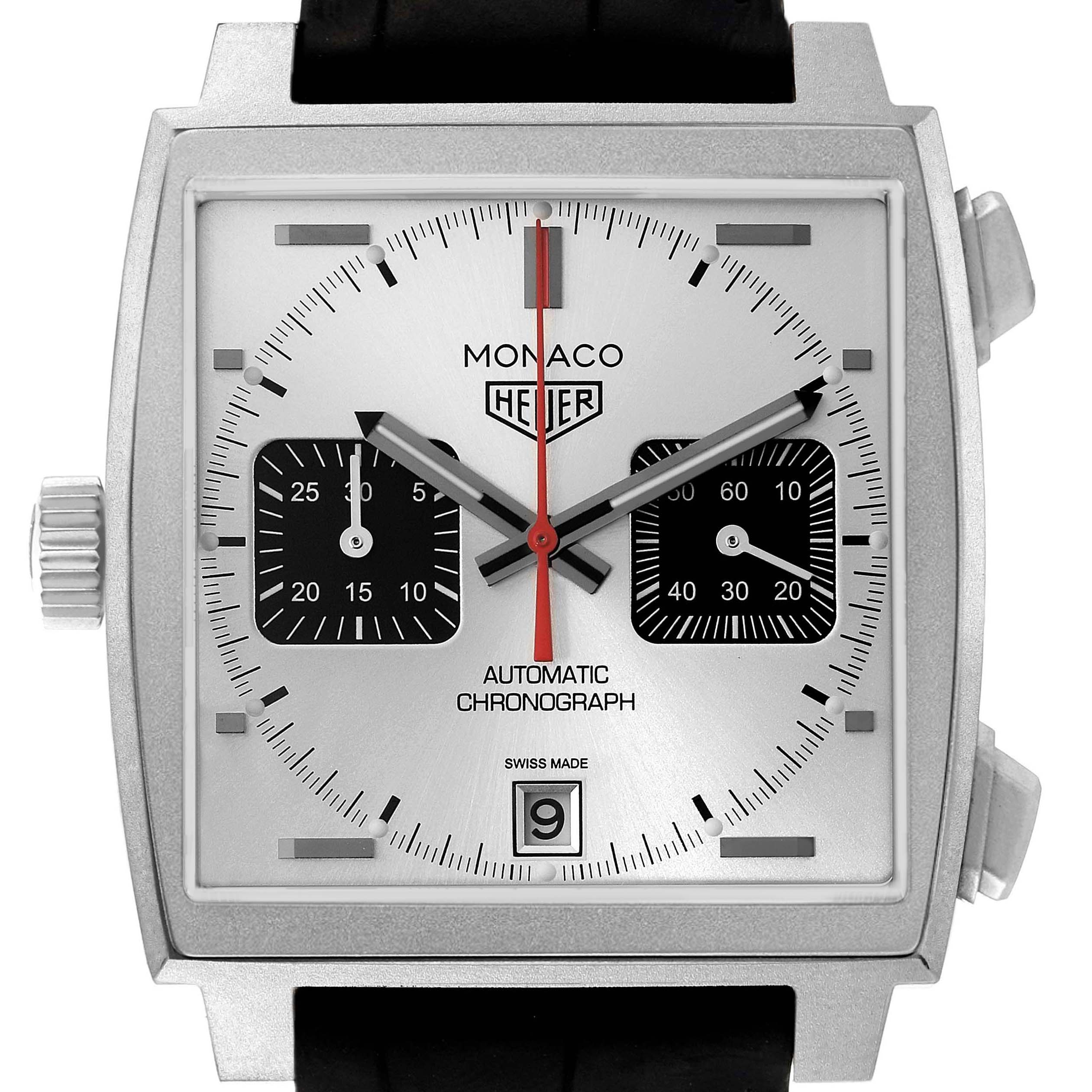 The image shows a frontal view of the Tag Heuer Monaco CAW218B.FC6496 Men's Titanium Silver Dial watch, highlighting the dial, subdials, and date window.