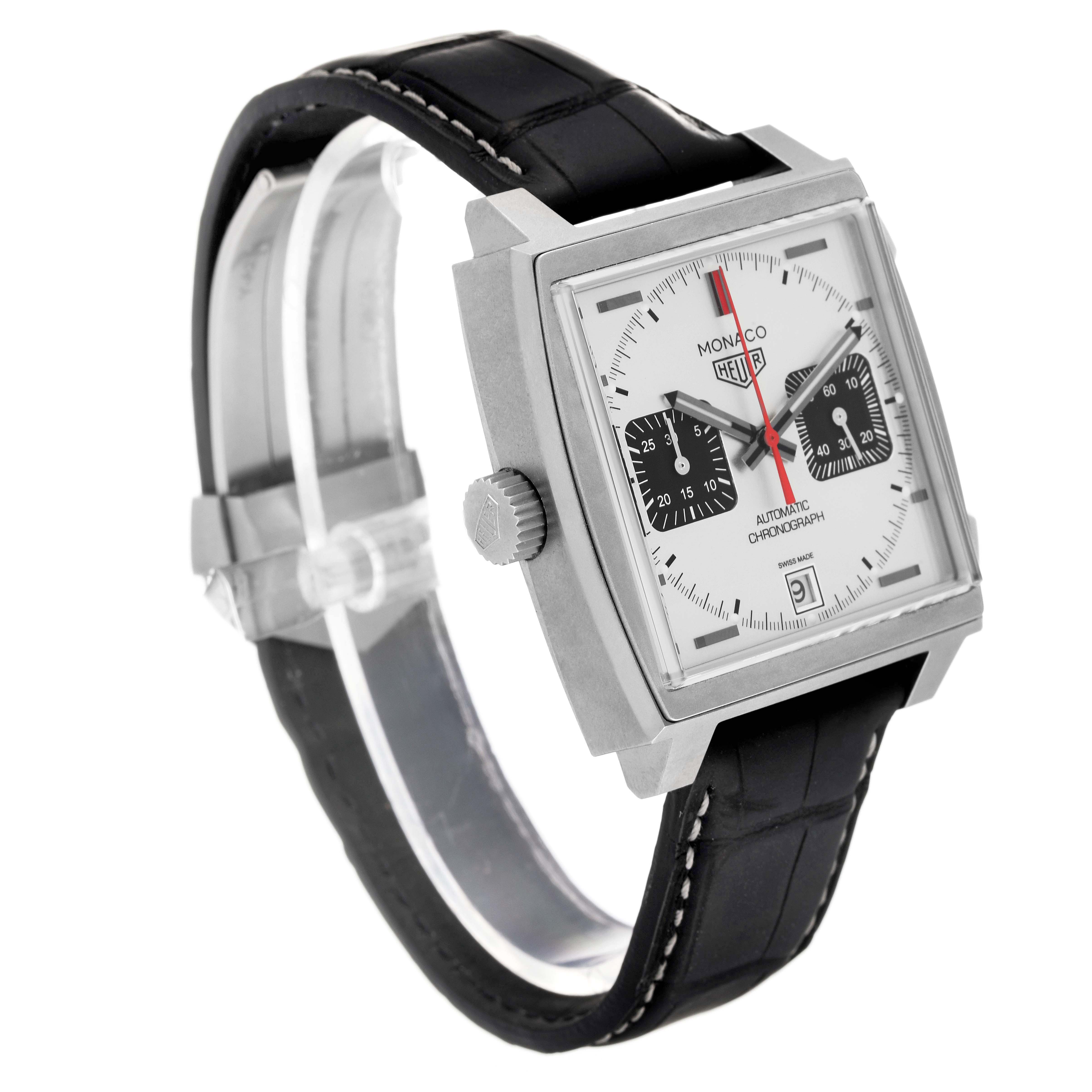 The Tag Heuer Monaco CAW218B.FC6496 Men's Titanium Silver Dial watch is shown at an angled side view, displaying the square face, strap, and crown.