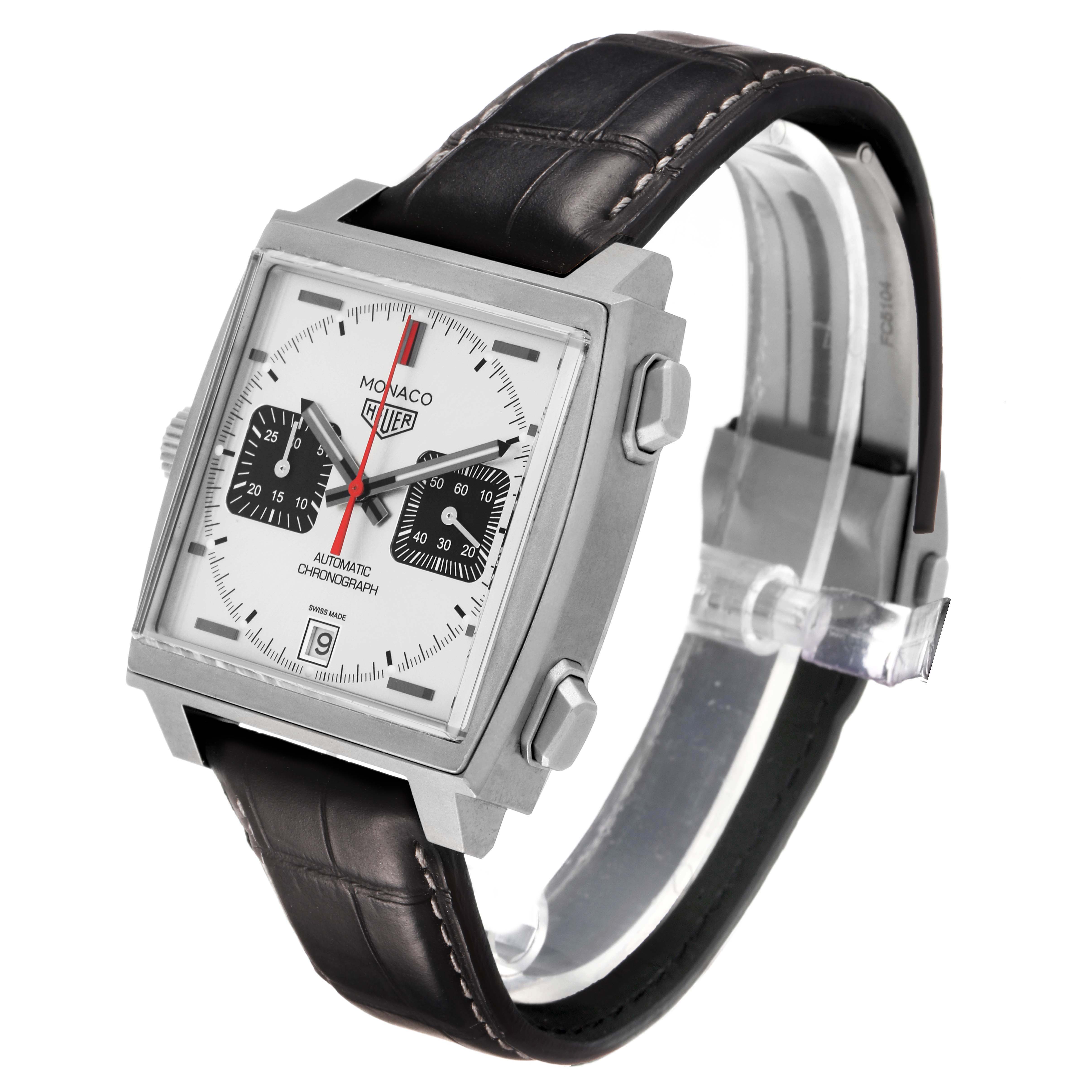 The Tag Heuer Monaco CAW218B.FC6496 Men's Titanium Silver Dial watch is shown at a slight angle, highlighting its square face, chronograph dials, and leather strap.