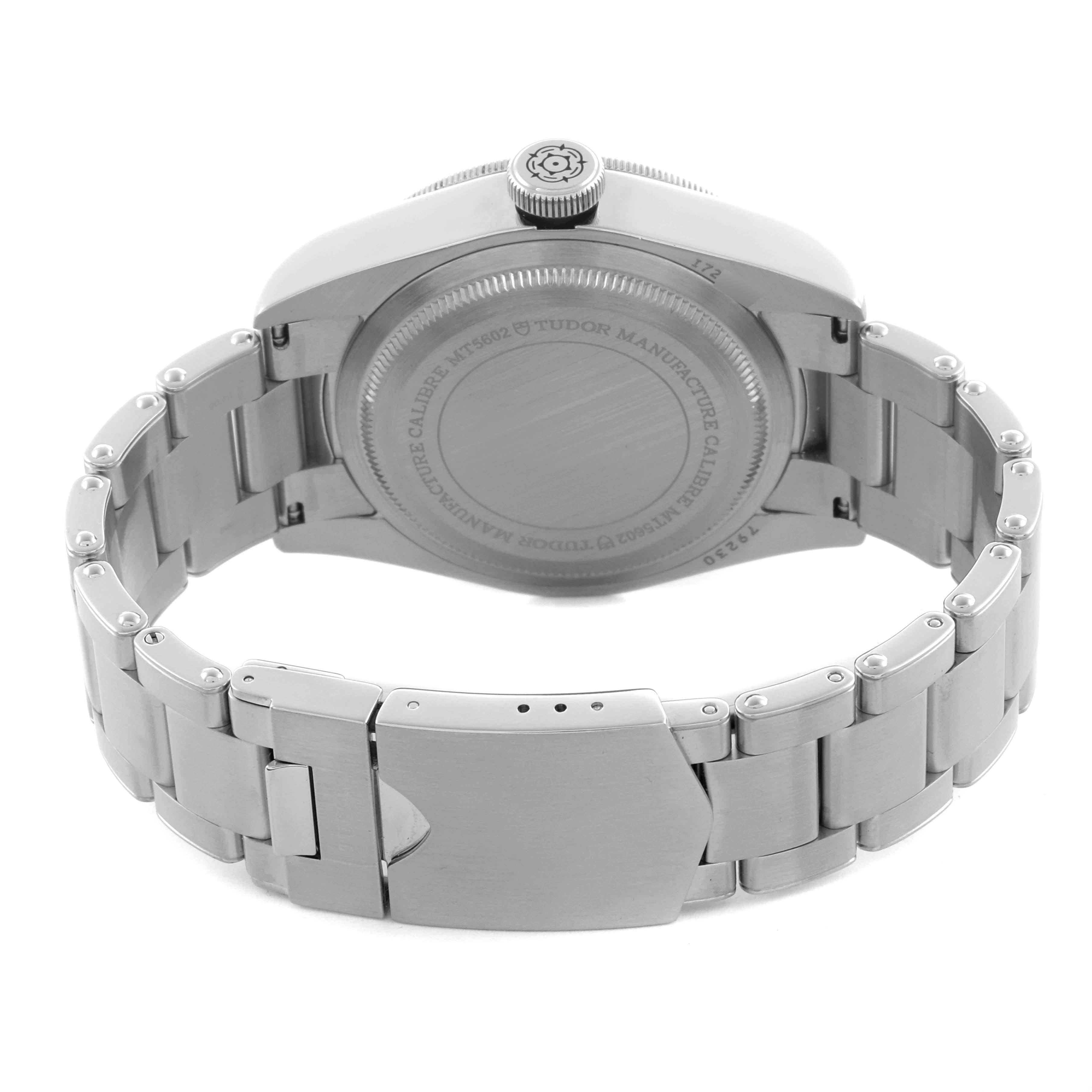 The image shows the Tudor Heritage Black Bay 79230N Men's Stainless Steel Black Dial 79230N Men's Stainless Steel Black Dial watch from the back, highlighting the case back and stainless steel bracelet.