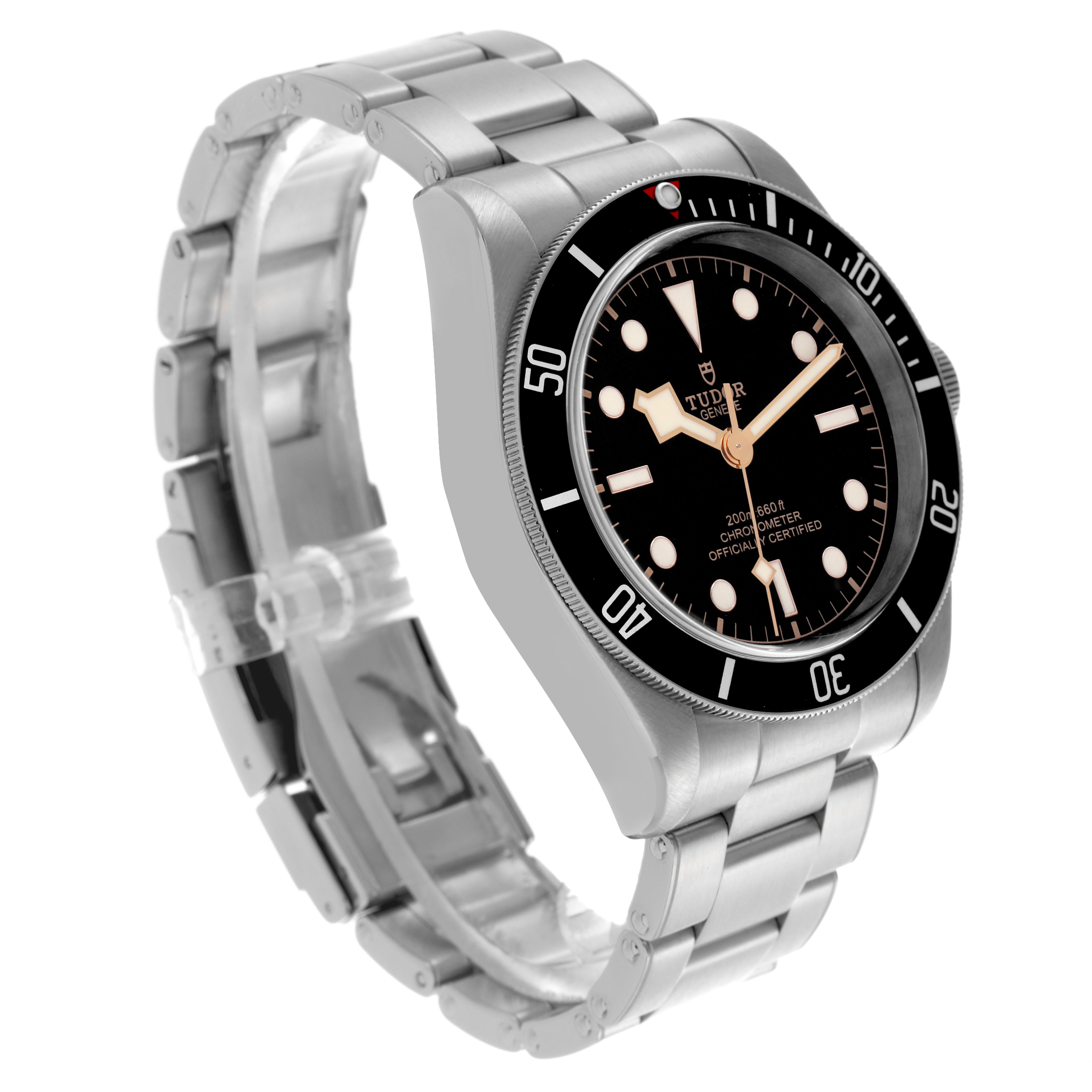 The Tudor Heritage Black Bay 79230N Men's Stainless Steel Black Dial 79230N Men's Stainless Steel Black Dial watch is shown at a slight side angle, highlighting the dial, bezel, and stainless steel bracelet.