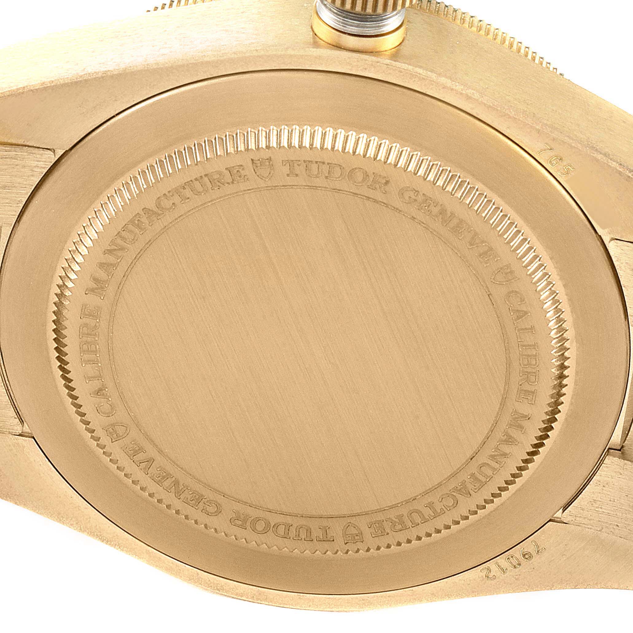 The image shows the close-up angle of the case back of a Tudor Heritage Black Bay 79012 Men
s Bronze Brown Dial 79012 Men
s Bronze Brown Dial watch, showcasing the engraved details.