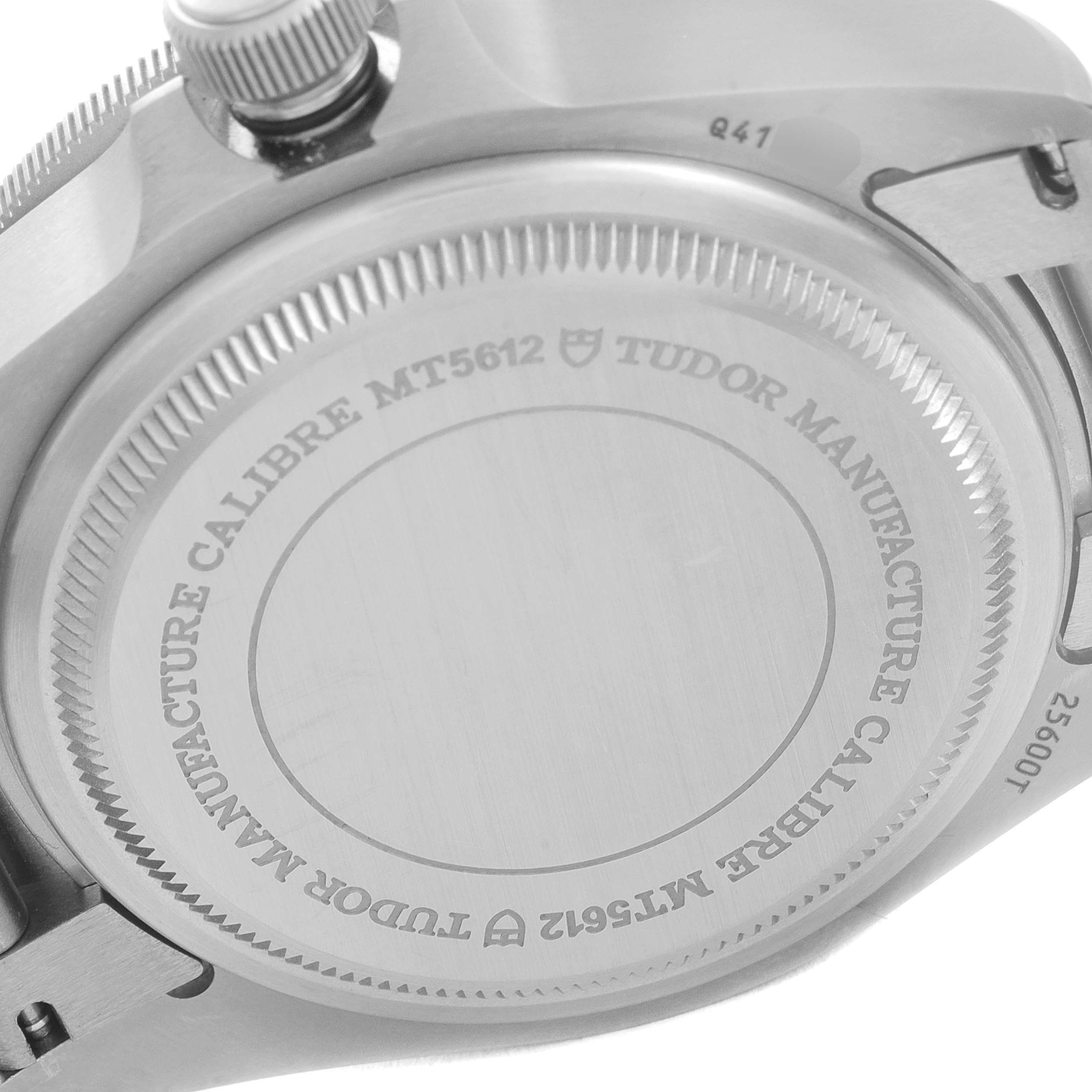 The image shows the case back and crown of the Tudor Pelagos 25600TB Men's Titanium Blue Dial 25600TB Men's Titanium Blue Dial model, highlighting the inscriptions and detailing.