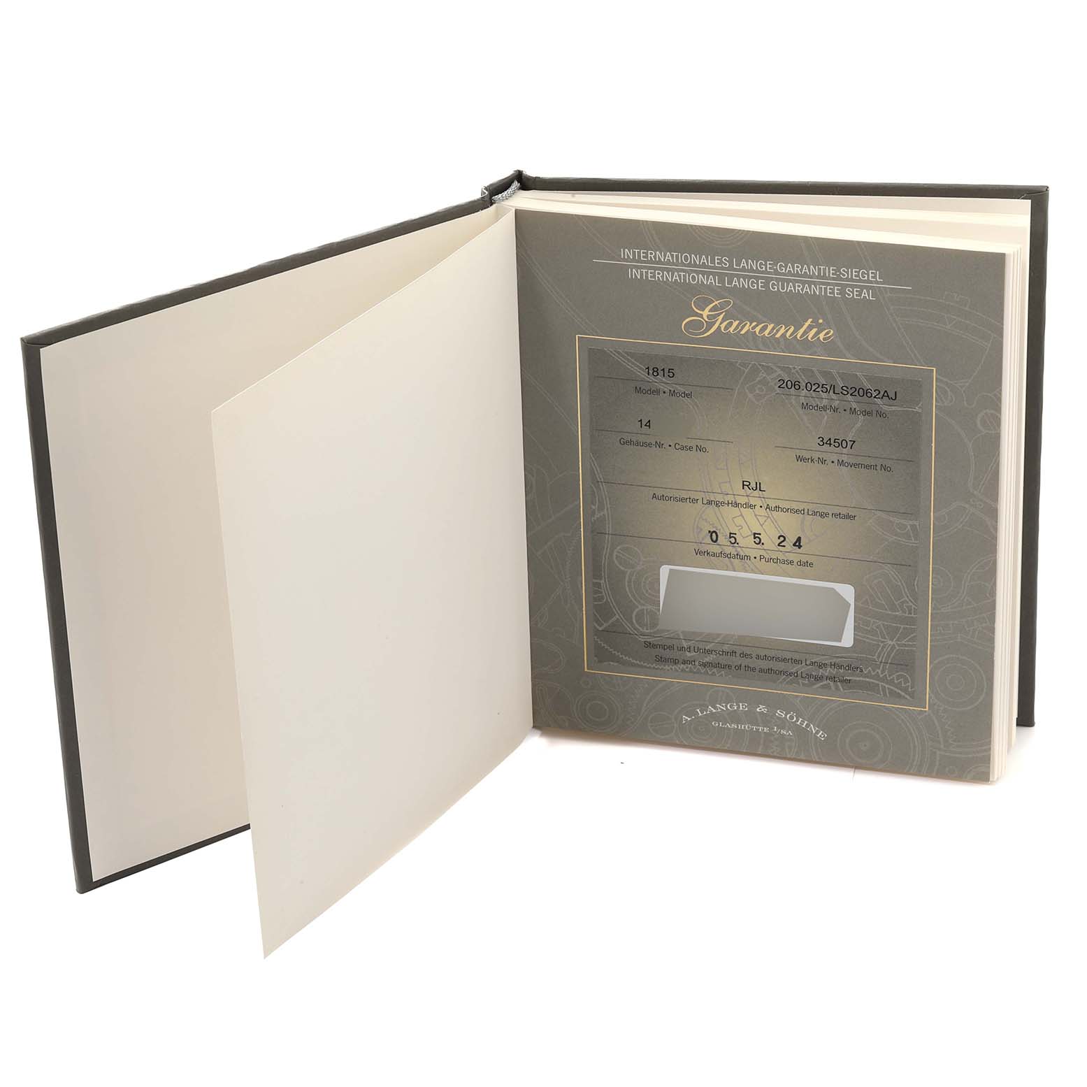 The image shows the opened warranty booklet for the 1815 model by A. Lange & Sohne, displaying warranty details.