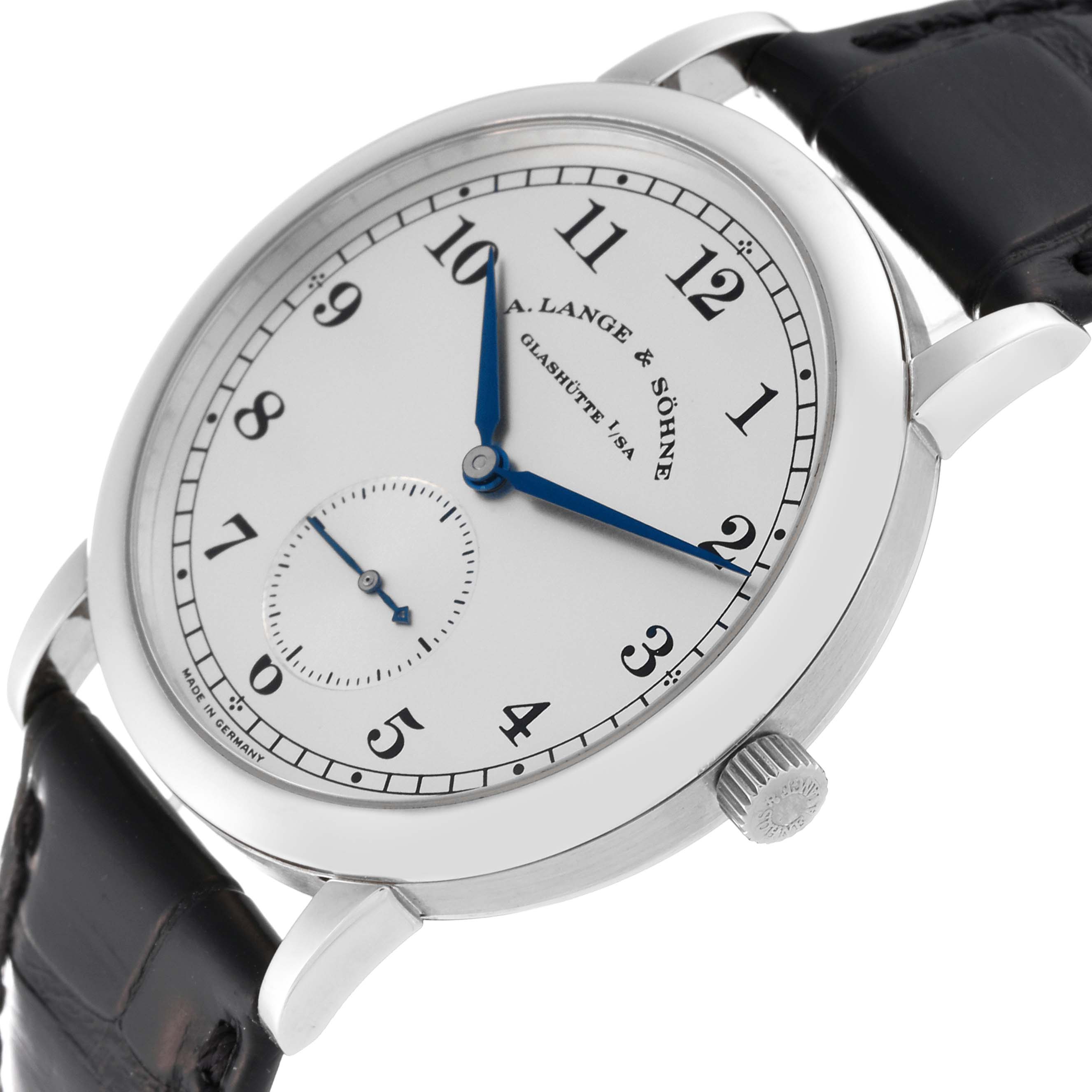 The image shows an A. Lange & Sohne 1815 model watch from a slightly tilted angle, highlighting the dial, crown, and leather strap.