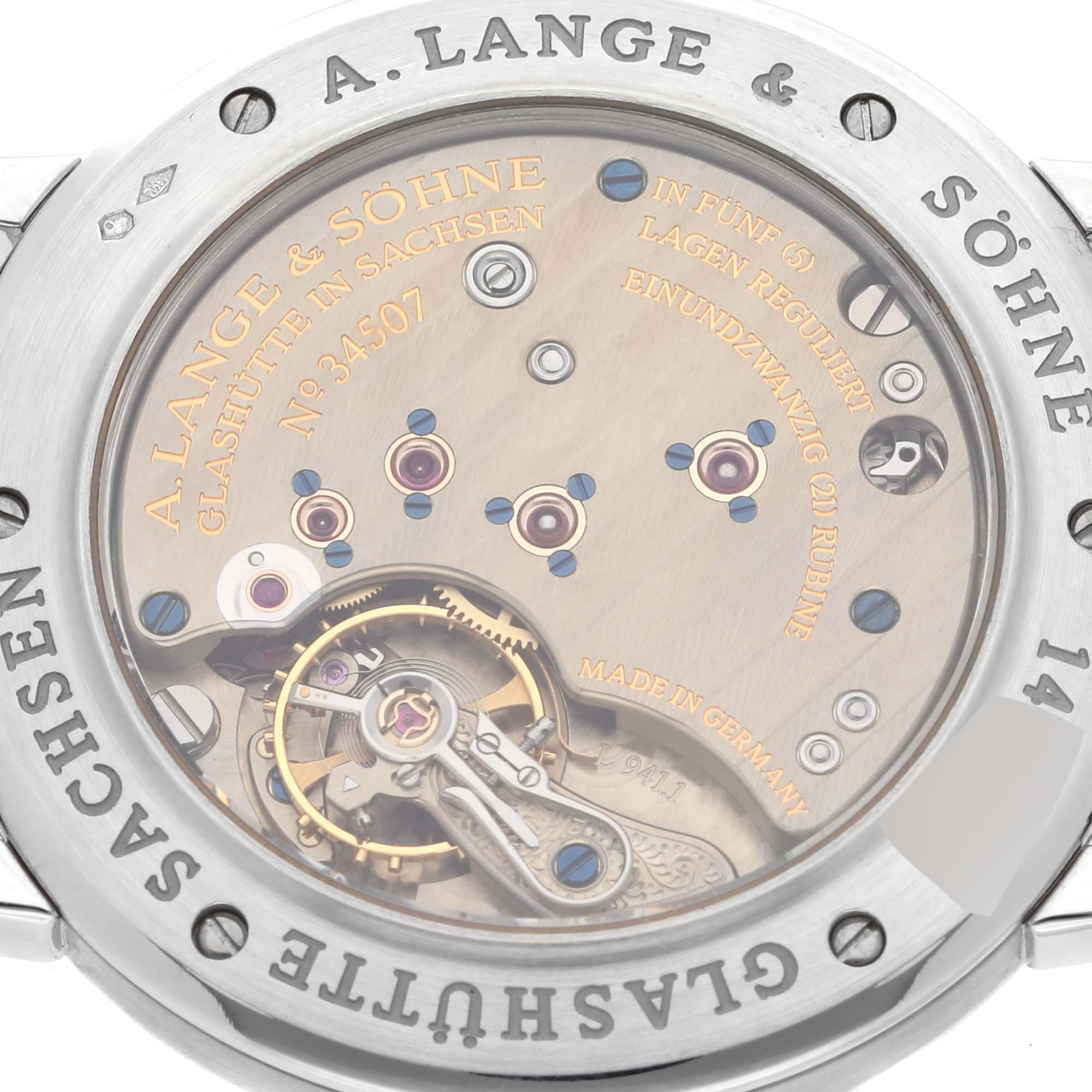 The image shows the back case and internal mechanism of an A. Lange & Sohne 1815 206.025/LS2062AJ Men's Platinum Silver Dial watch.