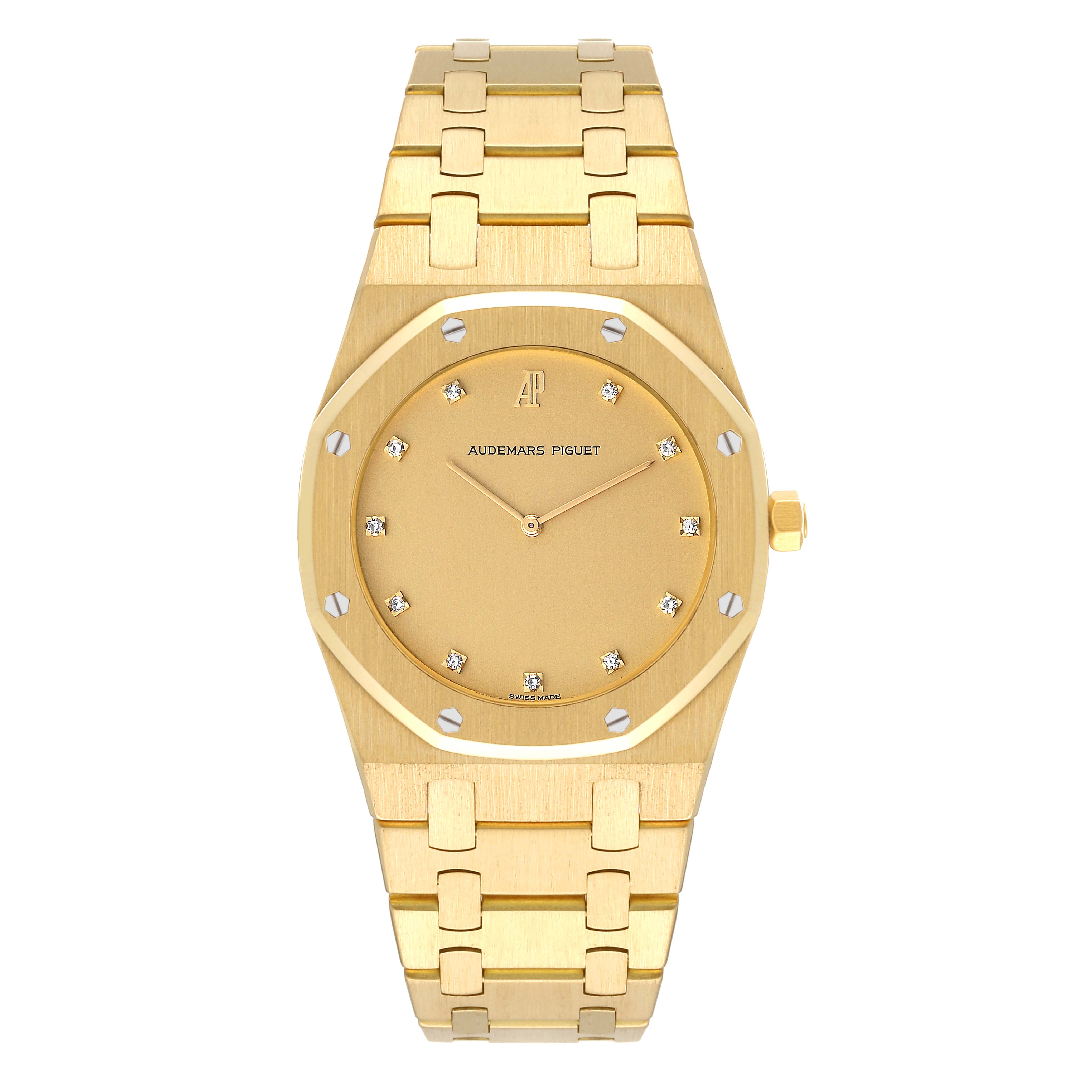 This is a front view of an Audemars Piguet Royal Oak Men's Yellow Gold Champagne Dial Men's Yellow Gold Champagne Dial watch, showing the entire face, dial, and bracelet.