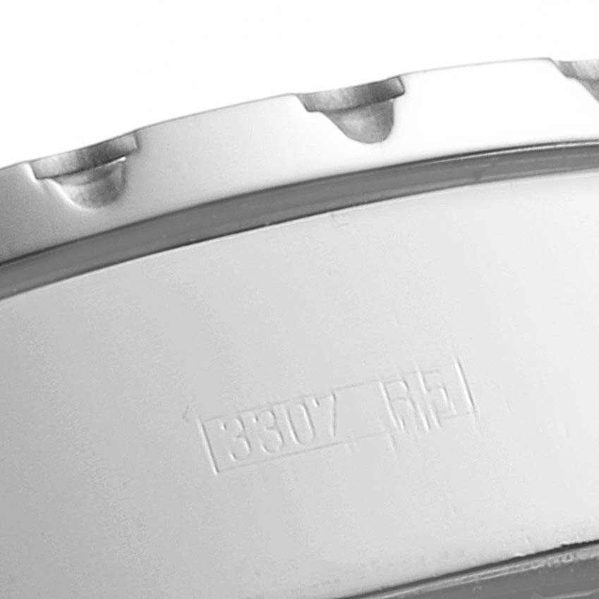This image shows a close-up of the bezel and part of the case back of a Breitling Professional Series A27362 Men's Stainless Steel Silver Dial A27362 Men's Stainless Steel Silver Dial watch.