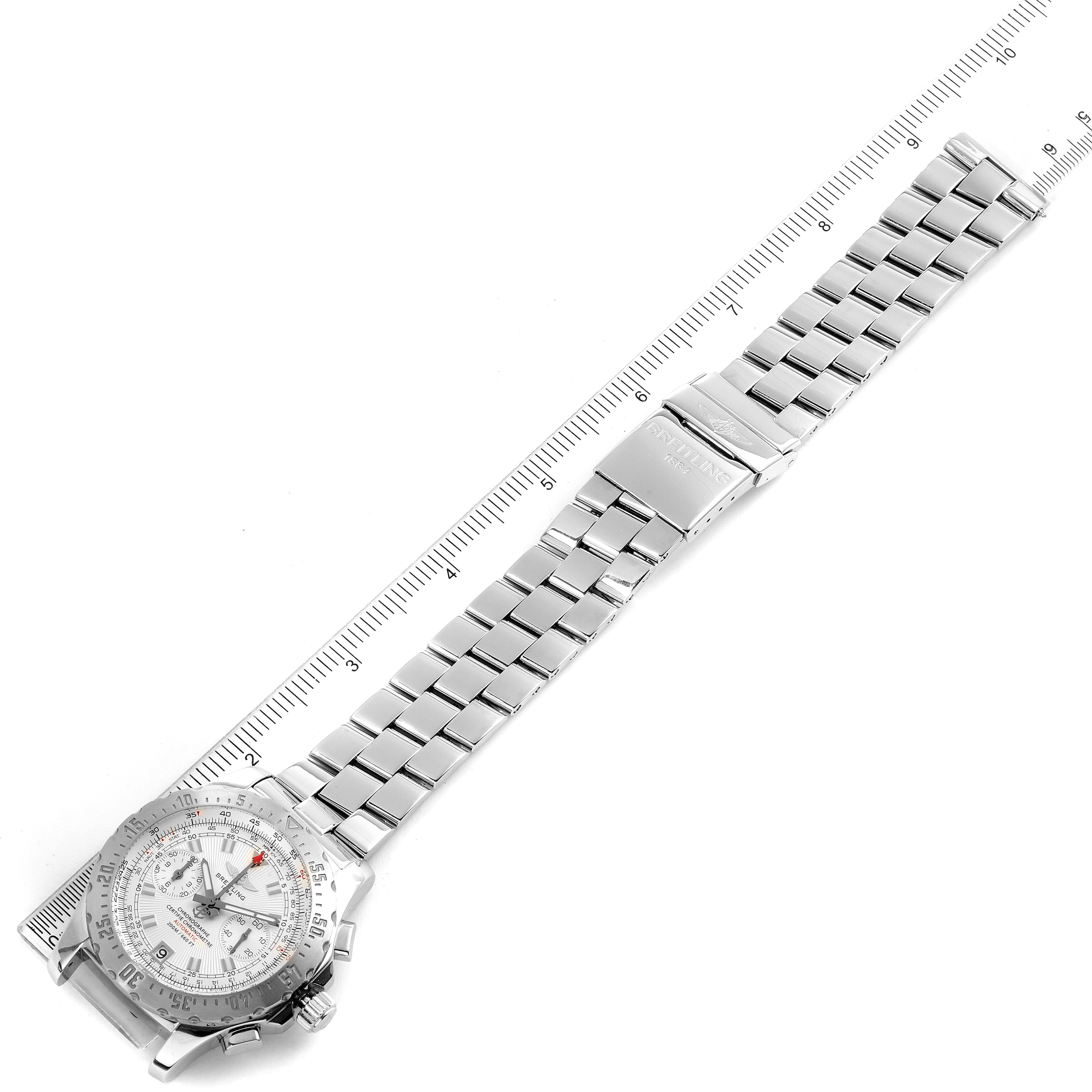 The image shows the full strap and face of the Breitling Professional Series A27362 Men's Stainless Steel Silver Dial A27362 Men's Stainless Steel Silver Dial watch laid flat on a ruler for measurement.