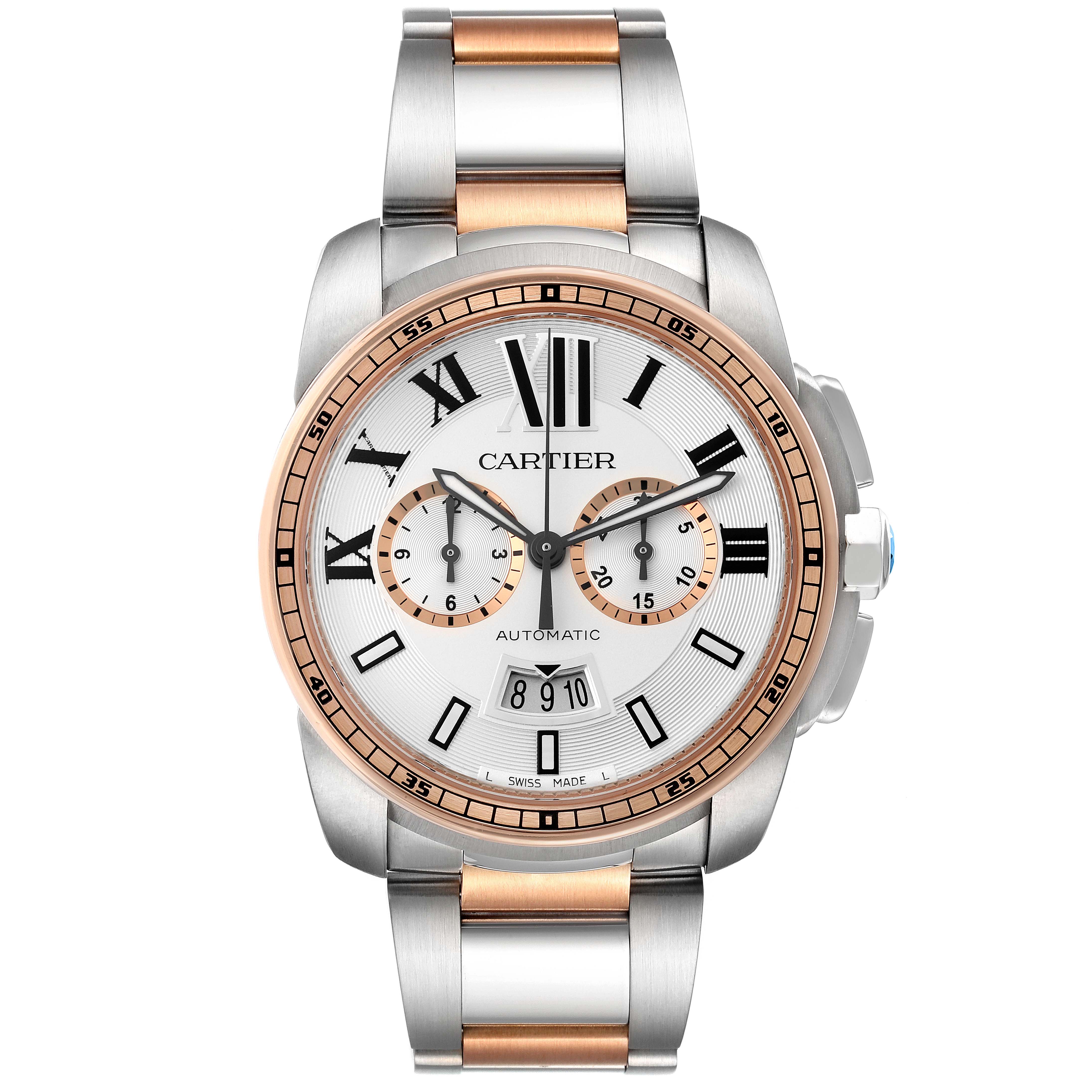 The Calibre de Cartier watch by Cartier is shown from a front angle, highlighting its dial, bezel, and metal strap.