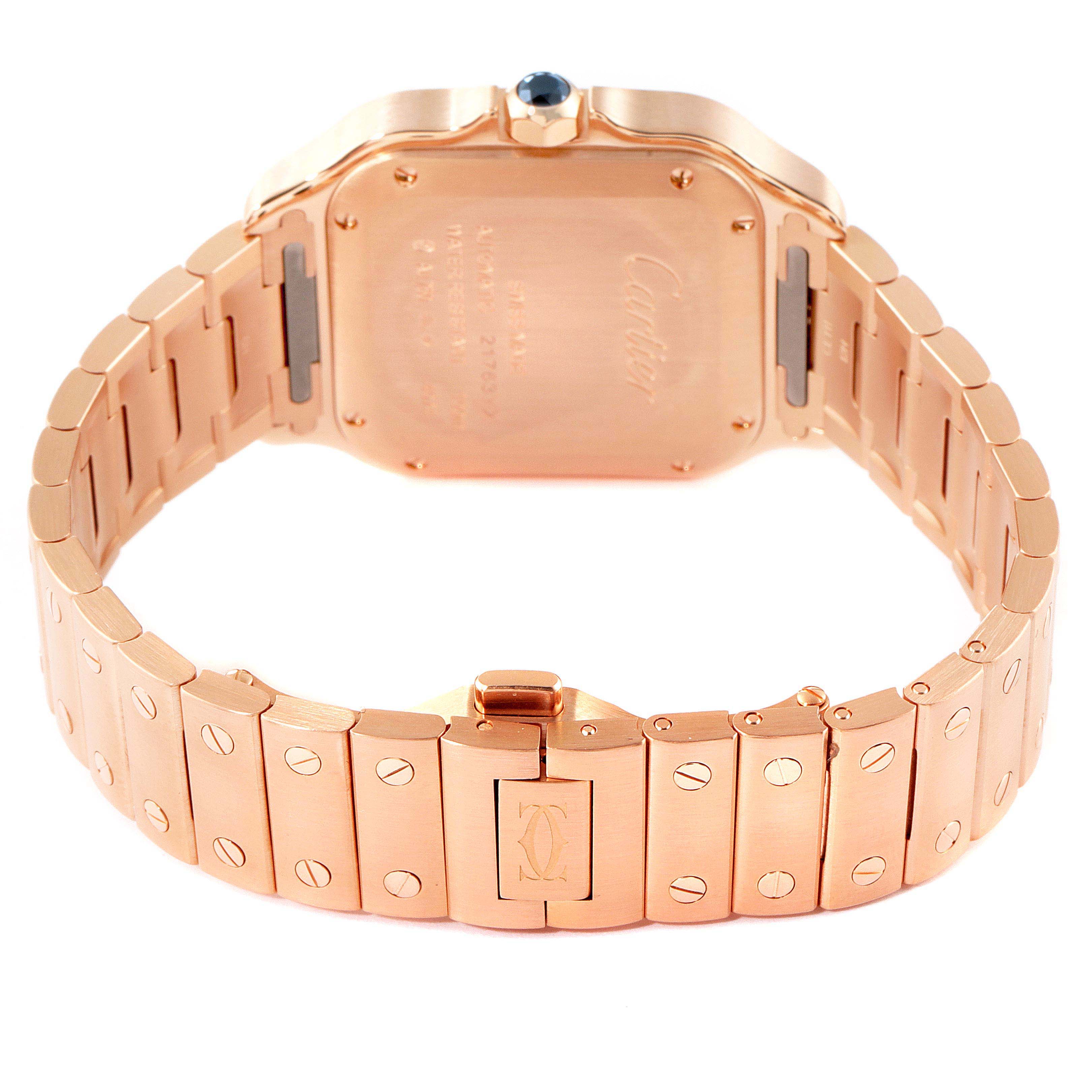 This image shows the back and bracelet of a Cartier Santos WGSA0008 Men's Rose Gold Silver Dial WGSA0008 Men's Rose Gold Silver Dial watch, highlighting its rose gold tone and clasp.