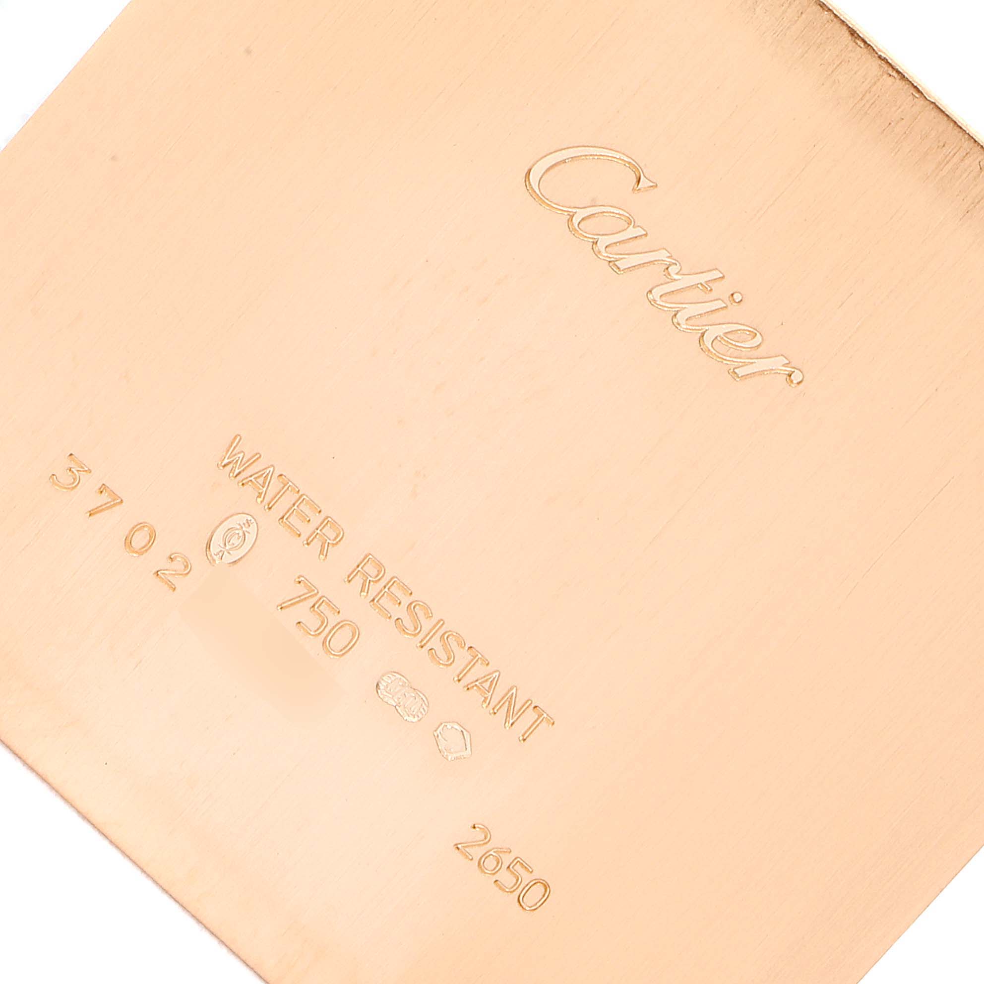 This image shows the back case of a Cartier Santos Dumont W2006951 Men's Rose Gold Silver Dial W2006951 Men's Rose Gold Silver Dial watch at an angled view.