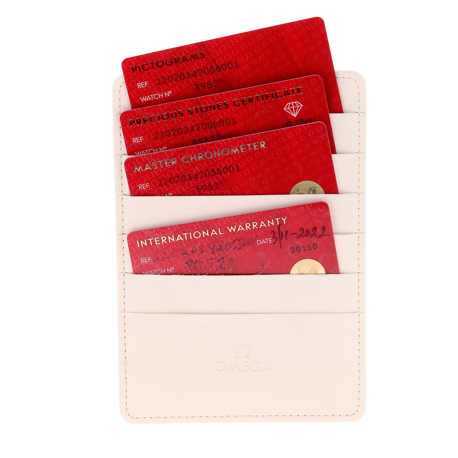 The image shows a set of red cards, including an international warranty and various certifications, for the Omega 220.20.34.20.55.001 Women's Steel and Gold (two tone) Mother of Pearl Dial 220.20.34.20.55.001 Women's Steel and Gold (two tone) Mother of Pearl Dial Aqua Terra Sedna Gold Diamond Ladies Watch 220.20.34.20.55.001 Unworn model, displayed inside a white Omega 220.20.34.20.55.001 Women's Steel and Gold (two tone) Mother of Pearl Dial 220.20.34.20.55.001 Women's Steel and Gold (two tone) Mother of Pearl Dial cardholder.
