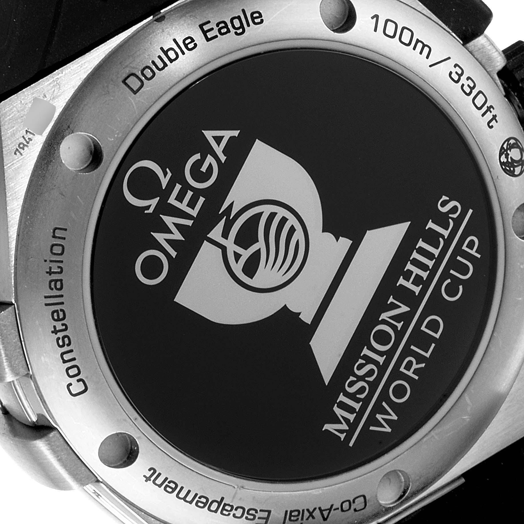 The image shows the back case of an Omega Constellation 121.92.35.50.01.00 Men's Titanium Black Dial 121.92.35.50.01.00 Men's Titanium Black Dial watch, highlighting the Mission Hills World Cup branding.