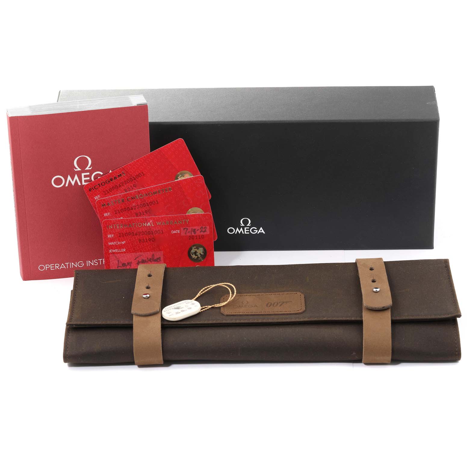 The image shows the packaging, operating instruction manual, warranty cards, and watch case for the Omega Seamaster 210.90.42.20.01.001 Men's Titanium Brown Dial 210.90.42.20.01.001 Men's Titanium Brown Dial model.