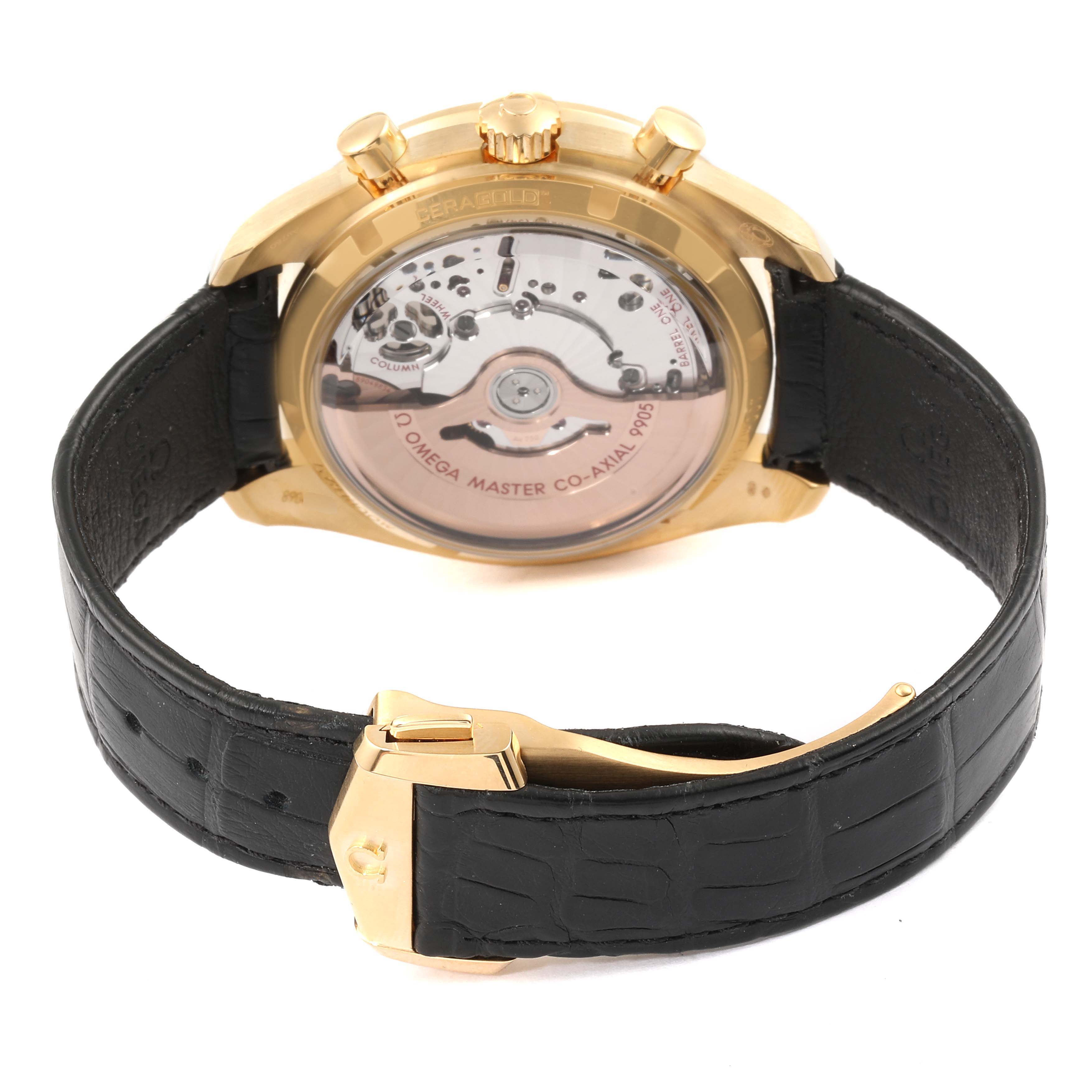 The image shows the back view of an Omega Speedmaster 304.63.44.52.02.001  Men's Yellow Gold Silver Dial 304.63.44.52.02.001  Men's Yellow Gold Silver Dial model, highlighting its transparent caseback and black leather strap.