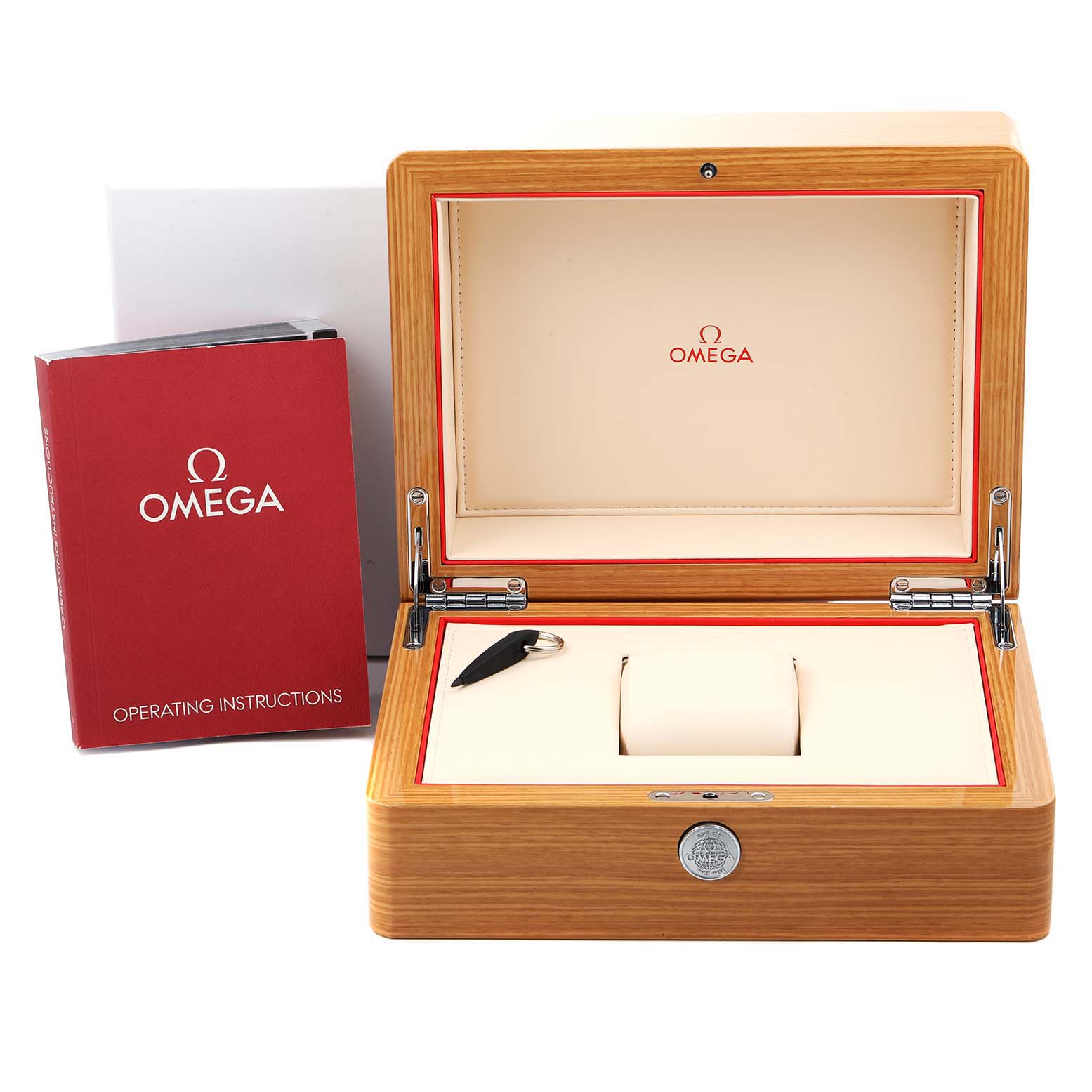 The image shows an Omega Speedmaster 326.30.40.50.01.001 Men
s Stainless Steel Black Dial 326.30.40.50.01.001 Men
s Stainless Steel Black Dial watch box, operating instructions, and a small key.