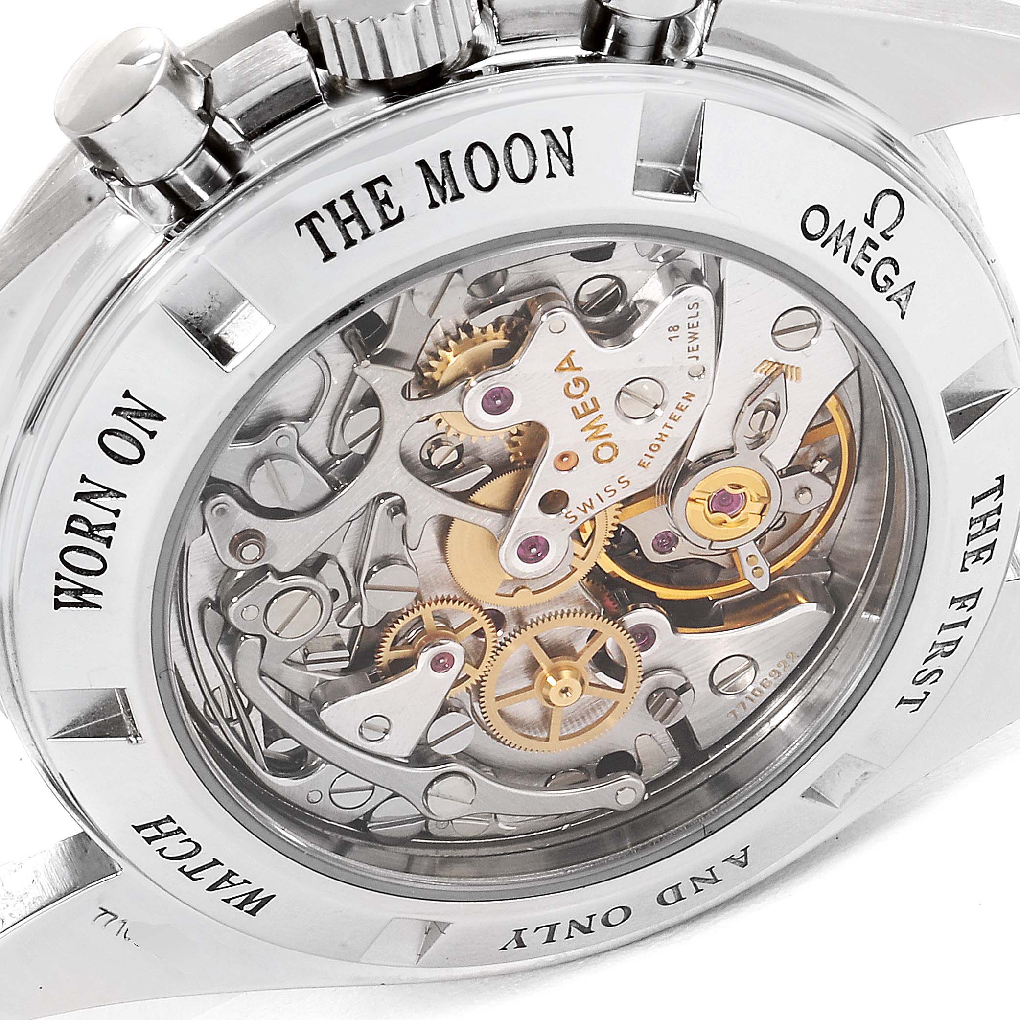 The Omega Speedmaster 3573.50.00 Men's Stainless Steel Black Dial 3573.50.00 Men's Stainless Steel Black Dial watch is shown from the back, revealing its intricate mechanical movement and engraved text.