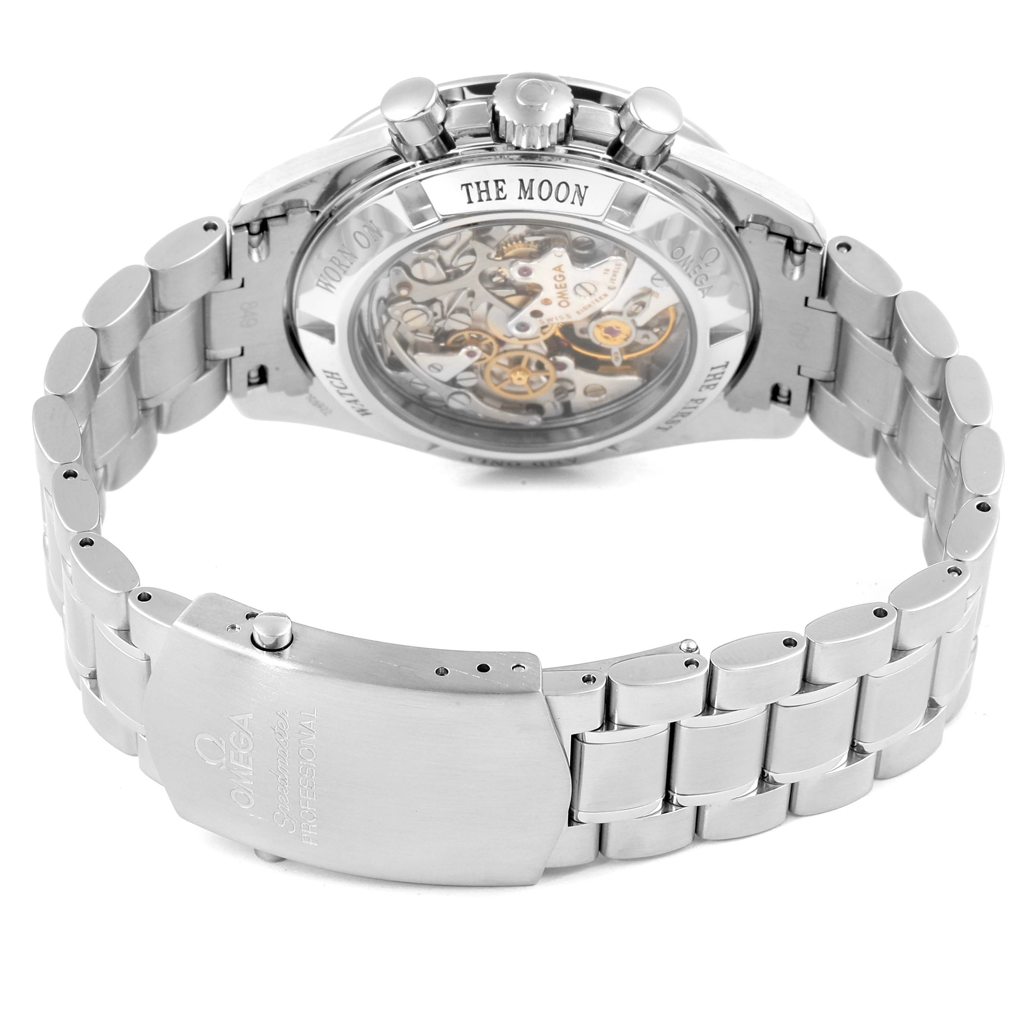 This image shows the backside of the Omega Speedmaster 3573.50.00 Men's Stainless Steel Black Dial 3573.50.00 Men's Stainless Steel Black Dial watch, highlighting the transparent case back and metal bracelet.