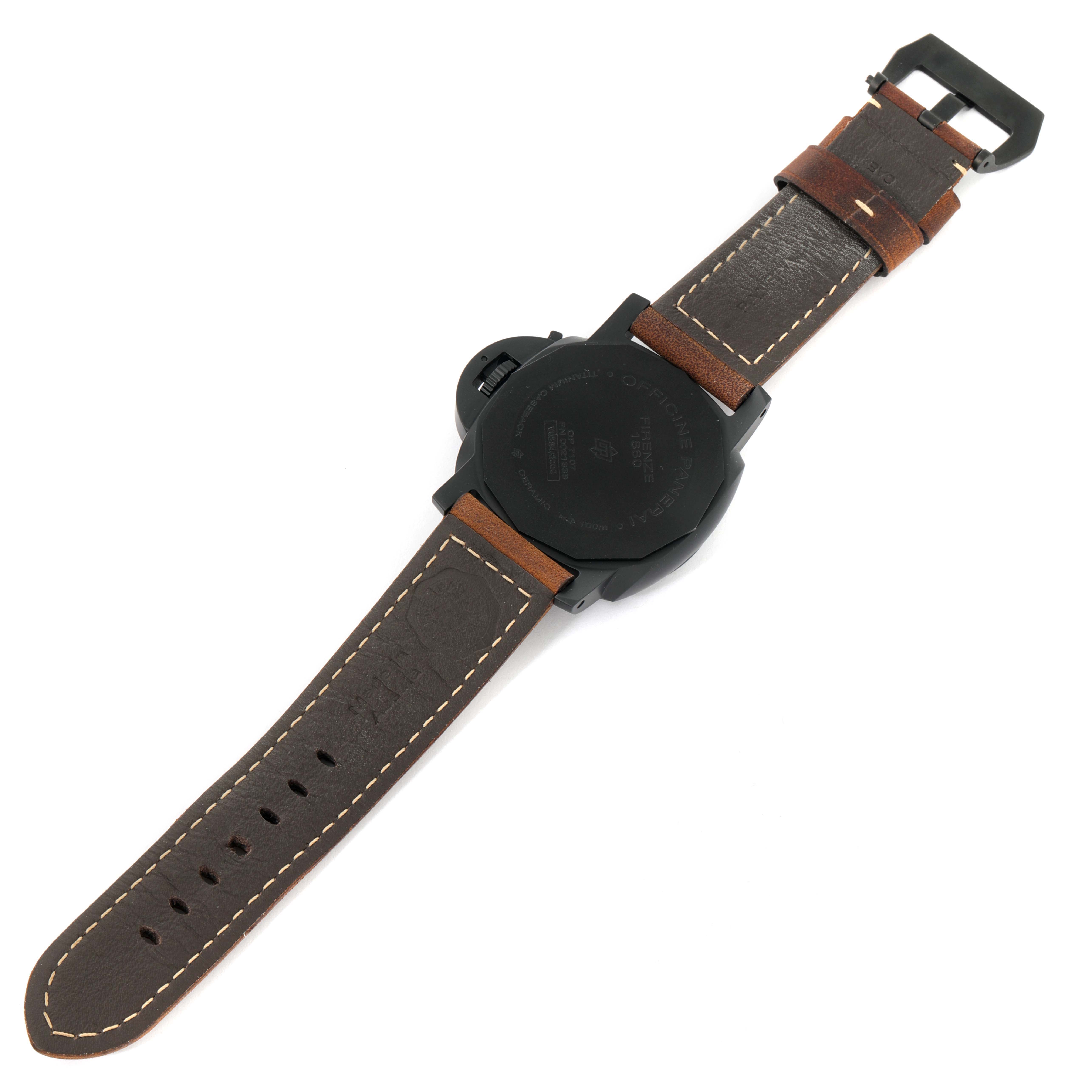 The image shows the back of a Panerai Luminor PAM01441 Men's Ceramic Black Dial PAM01441 Men's Ceramic Black Dial watch with a leather strap laid flat.